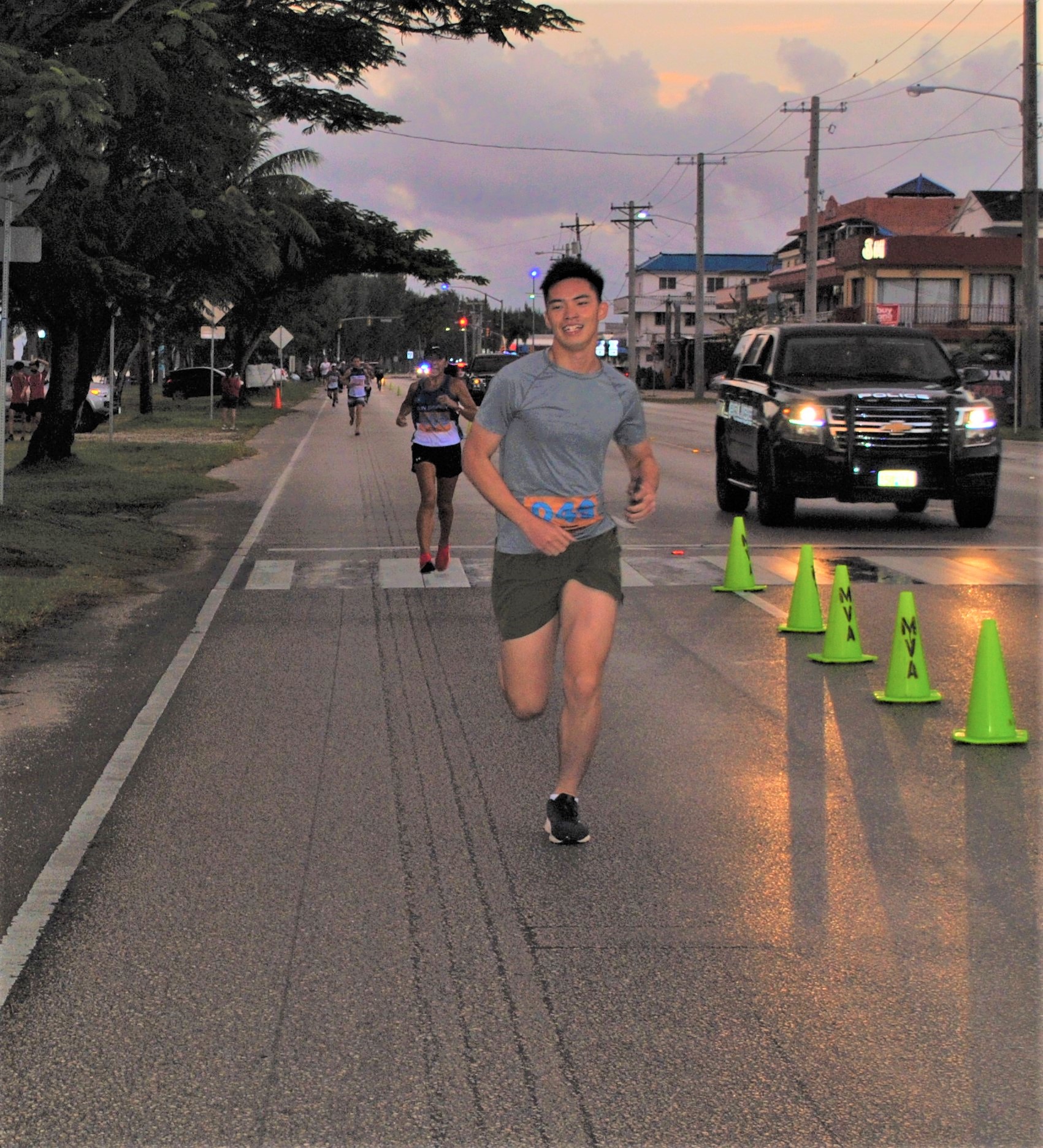 Yu Ding Chai smiles as he reaches the final leg of the race.