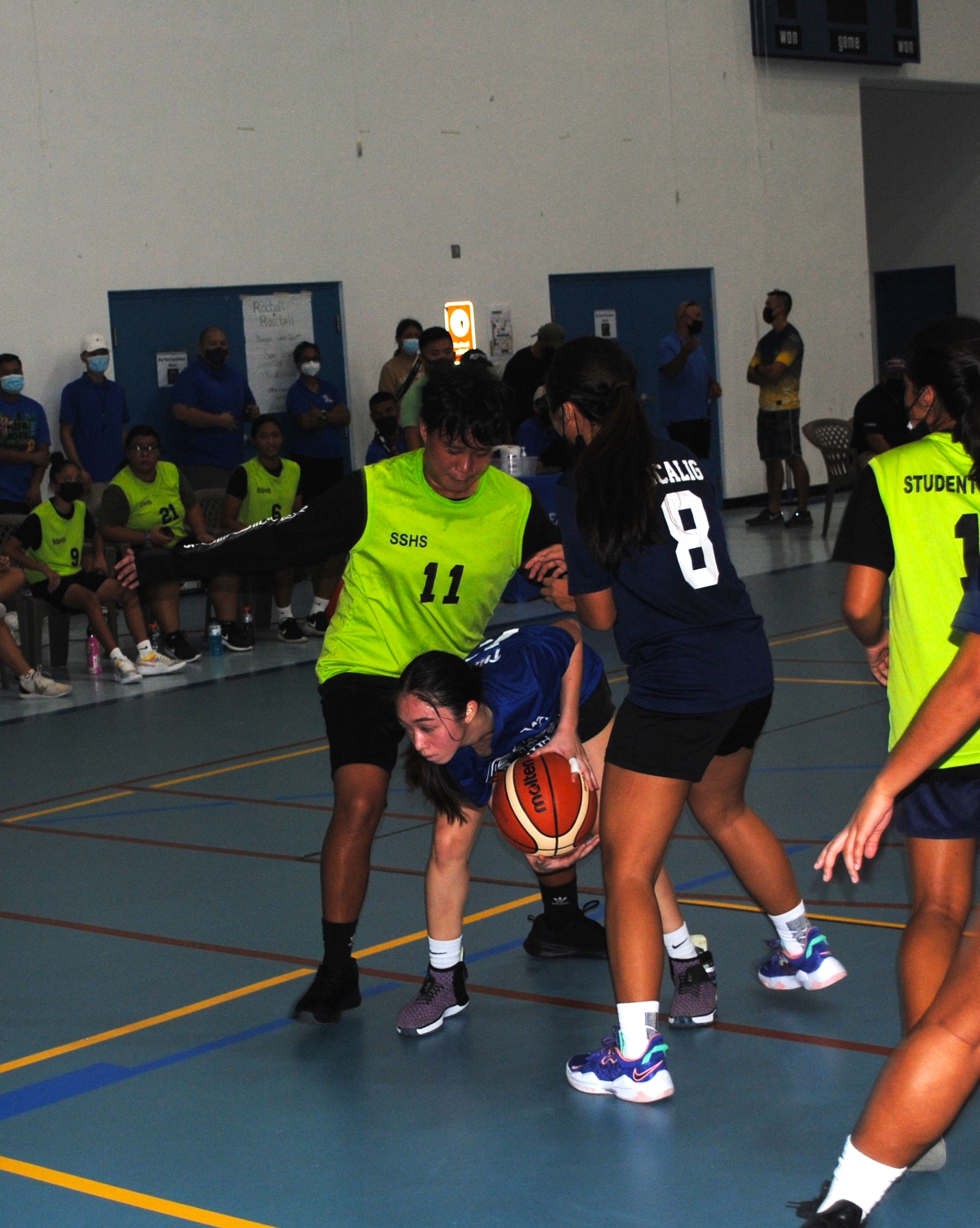 Kaia Travilla of MCS secures the possession as SSHS defenders close in during the opening game of the IT&E Interscholastic Basketball League-Girls High School on Wednesday at the MHS gym.