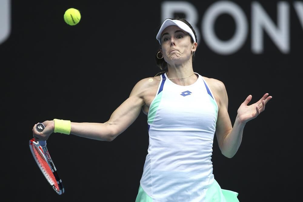 Alize Cornet of France plays a forehand during her singles match against Naomi Osaka of Japan at Summer Set tennis tournament ahead of the Australian Open in Melbourne, Australia, Tuesday. 