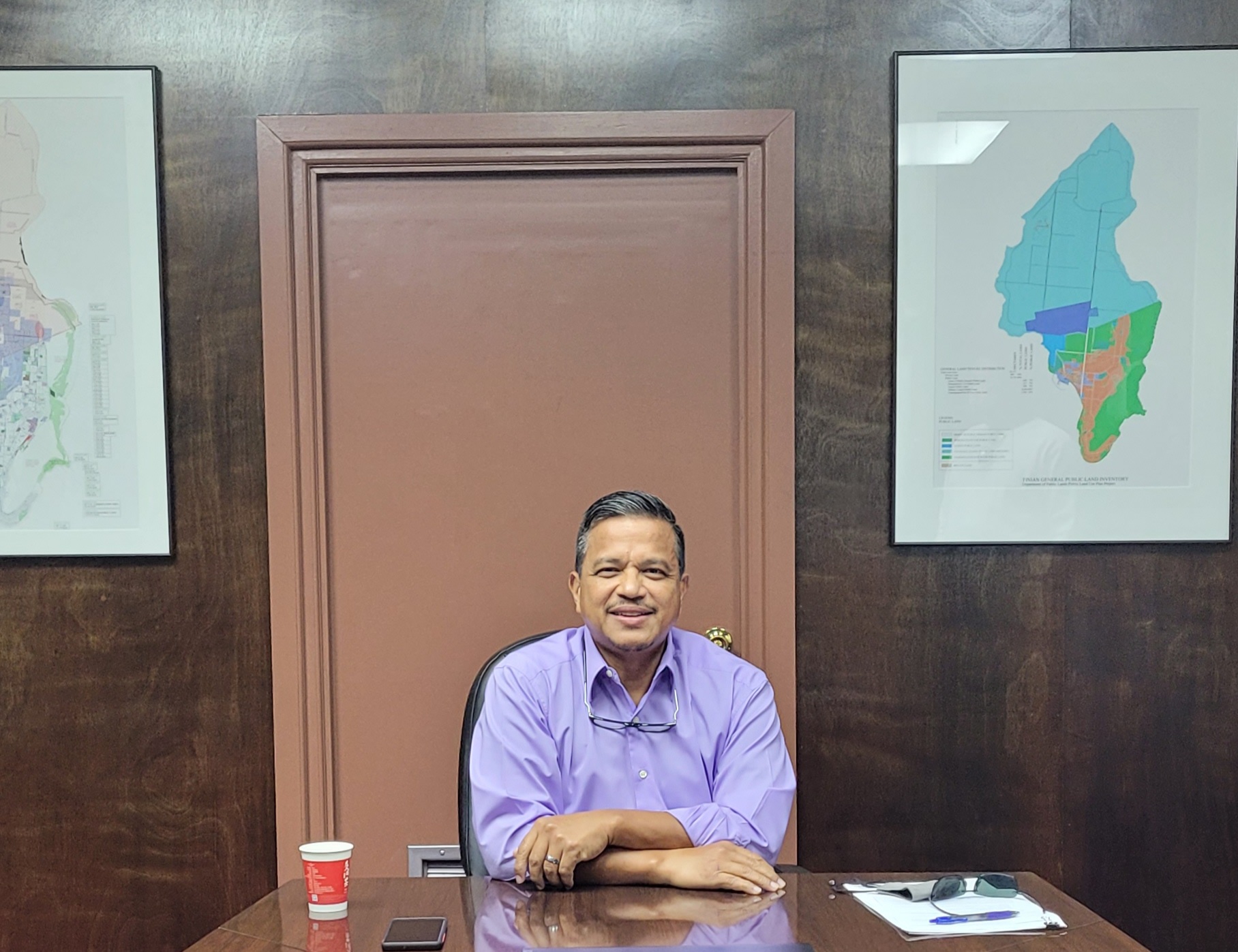 Senate President Jude U. Hofschneider poses for a photo in his office.