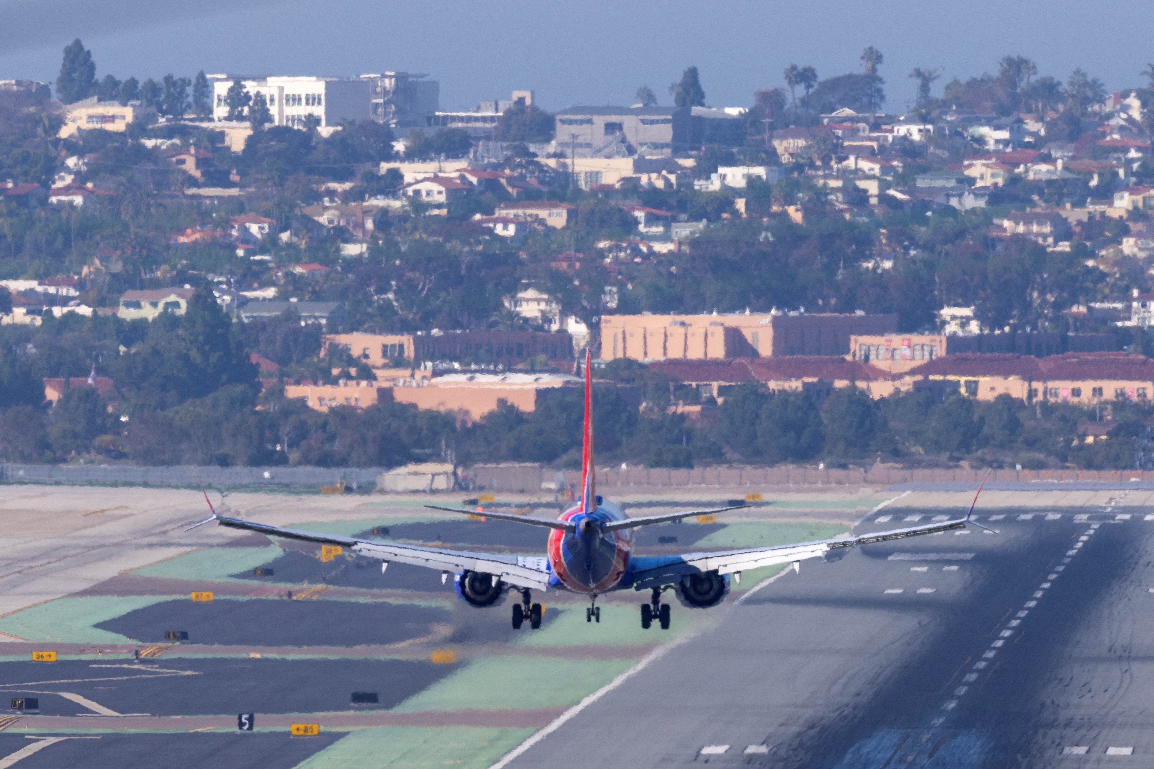 A Southwest Airlines plane approaches to land at San Diego International Airport as U.S. telecom companies, airlines and the FAA continue to discuss the potential impact of 5G wireless services on aircraft electronics in San Diego, California, Jan. 6, 2022.