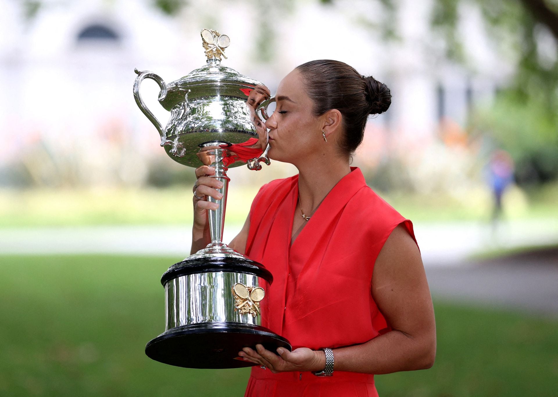 2022 Australian Open champion Australia's Ashleigh Barty poses with the trophy during a photo shoot at the Royal Exhibition Building in Melbourne on Jan. 30, 2022.