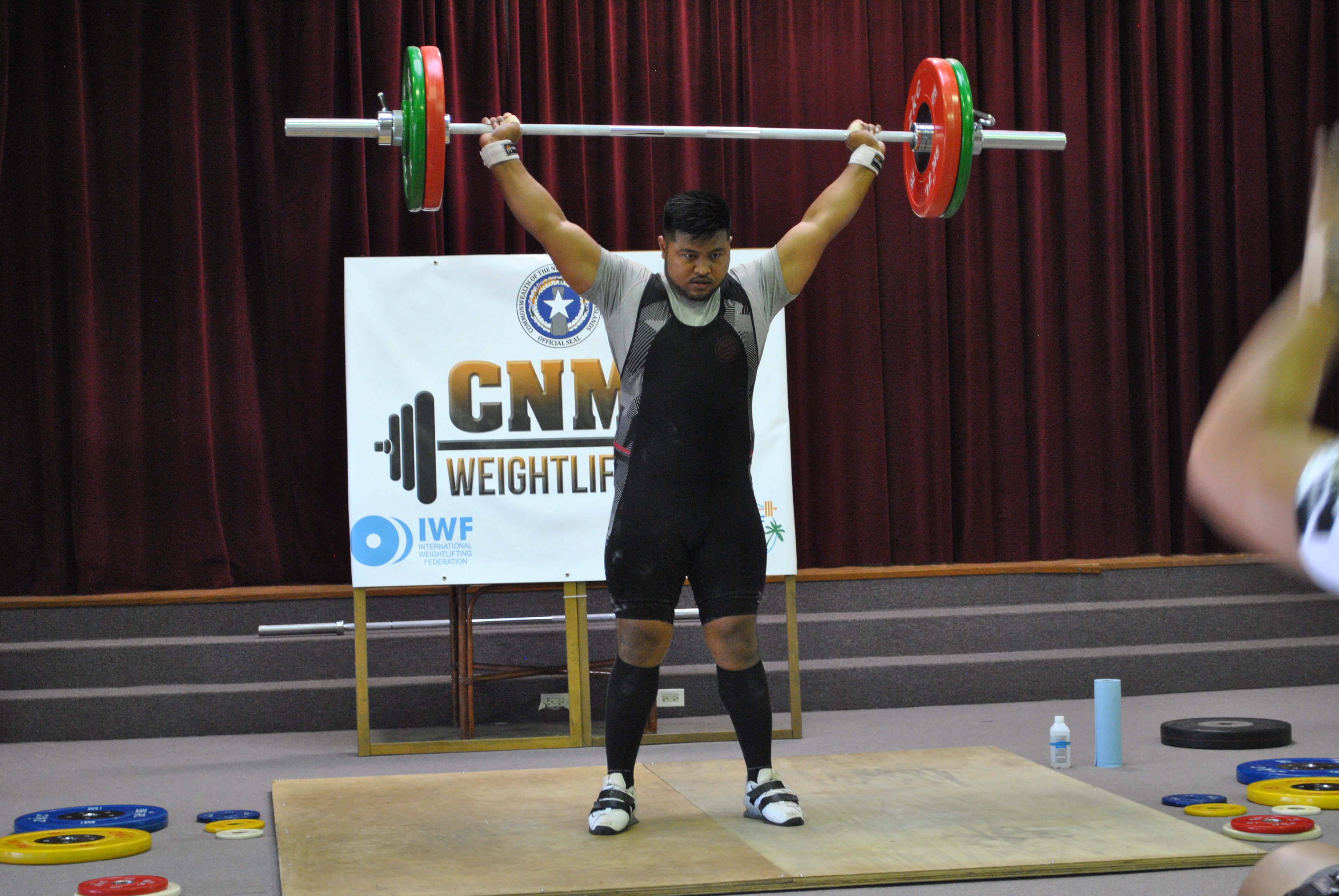 Jason Limes successfully executes a snatch during the 2nd Marianas Cup at the multi-purpose center on March 27, 2021.