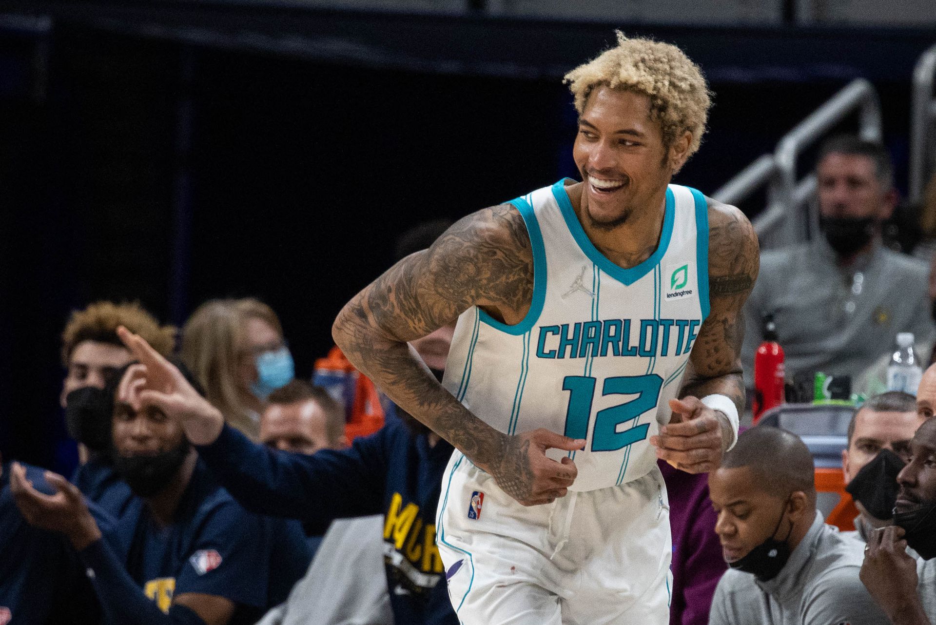 Charlotte Hornets guard Kelly Oubre Jr. (12) reacts to a made basket in the second half against the Indiana Pacers at Gainbridge Fieldhouse in Indianapolis, Indiana on Jan. 26, 2022.