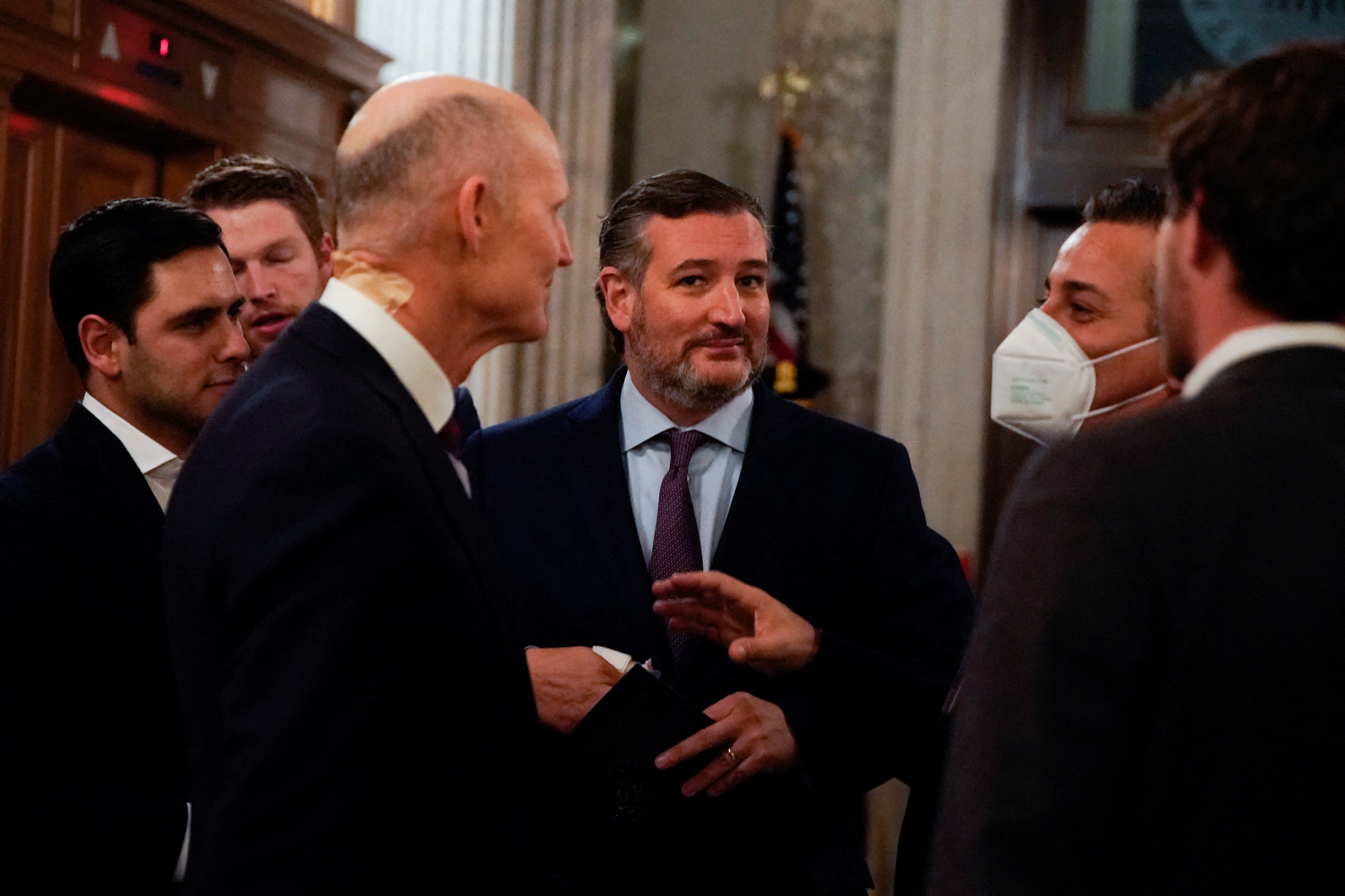 U.S. Sen. Ted Cruz, R-Tx., pauses during a conversation outside the Senate chamber as a procedural vote to advance the voting rights bill takes place at the U.S. Capitol in Washington, D.C., Jan. 19, 2022.