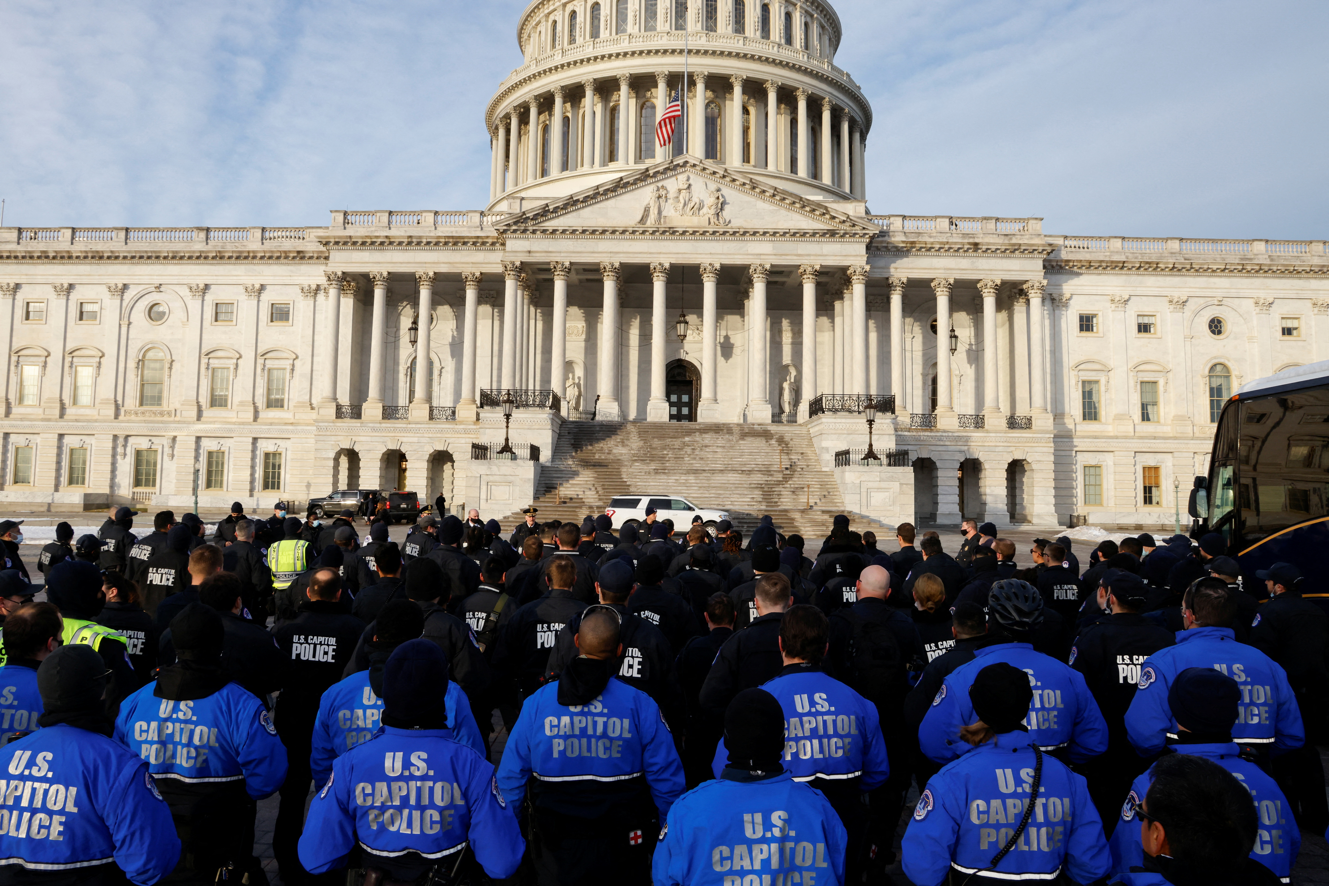 U.S. Capitol Police members are briefed by Chief J. Thomas Manger on the east side of the U.S. Capitol on the first anniversary of the Jan. 6, 2021 attack on the Capitol by supporters of former President Donald Trump in Washington, D.C., Jan. 6, 2022.