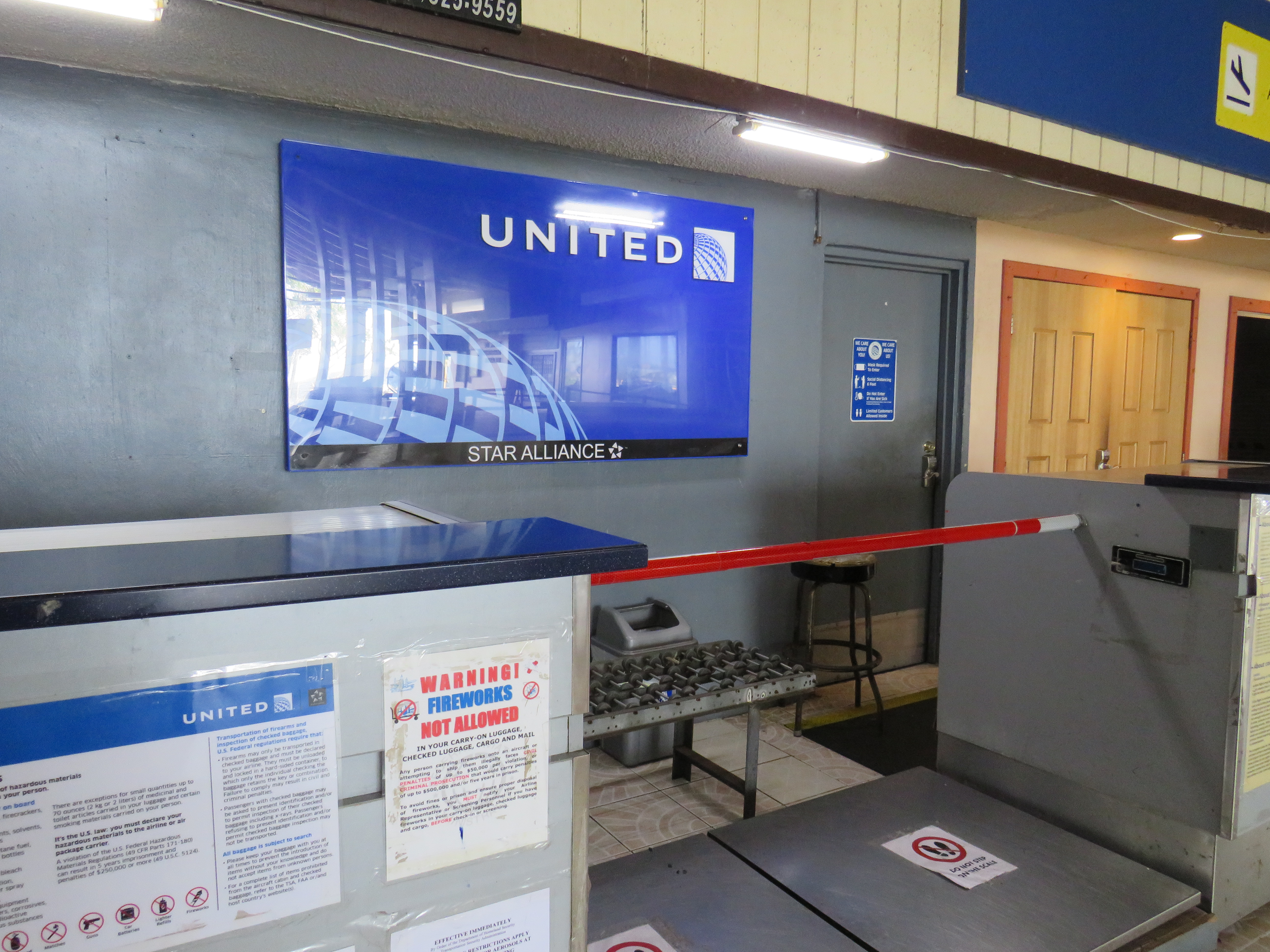 The United Airlines check-in area at Amata Kabua International Airport in Majuro: the airline recently vacated its office behind the check in area due to safety hazards and a just-discovered two-year-old engineering report confirms the main terminal roof poses a danger of collapse.