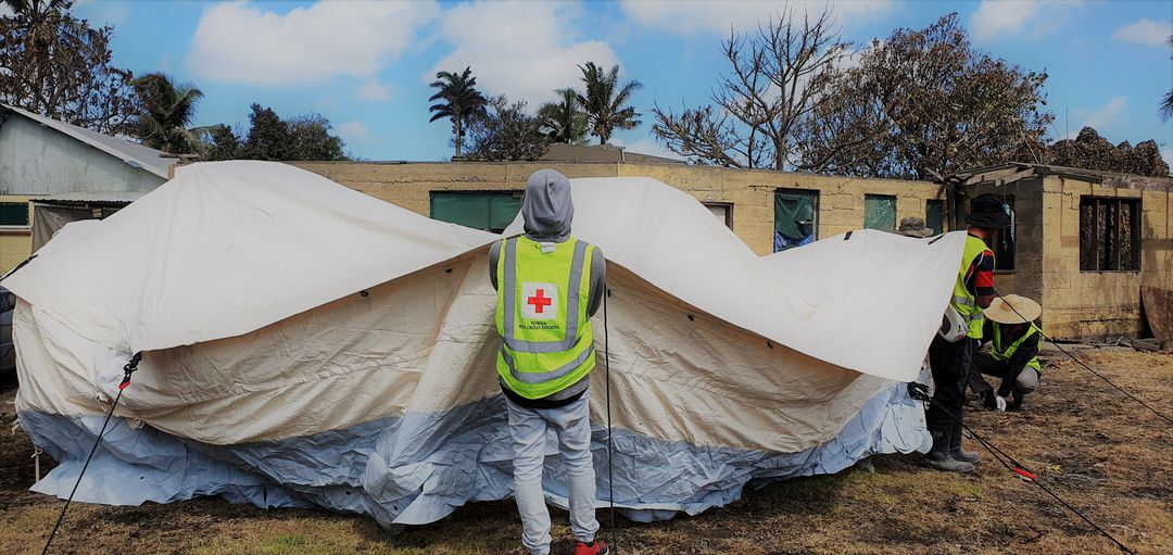 Members of Tonga's Red Cross society set up a temporary tent in Nuku’alofa, Tonga, Jan. 23, 2022.