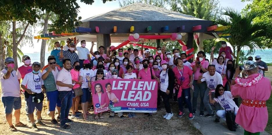 Supporters of Philippine presidential candidate Leni Robredo and her running mate Francis “Kiko” Pangilinan pose for a group photo at the Bicol Association pavilion in Susupe on Sunday after their successful “Pink Caravan” event.