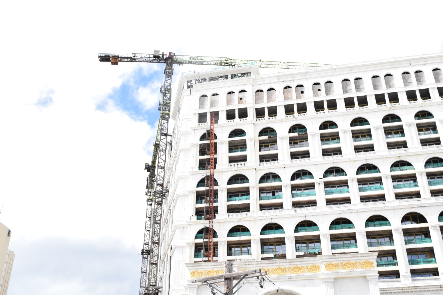 Tower crane No. 6 is seen at the unfinished Imperial Pacific International casino-hotel in Garapan.