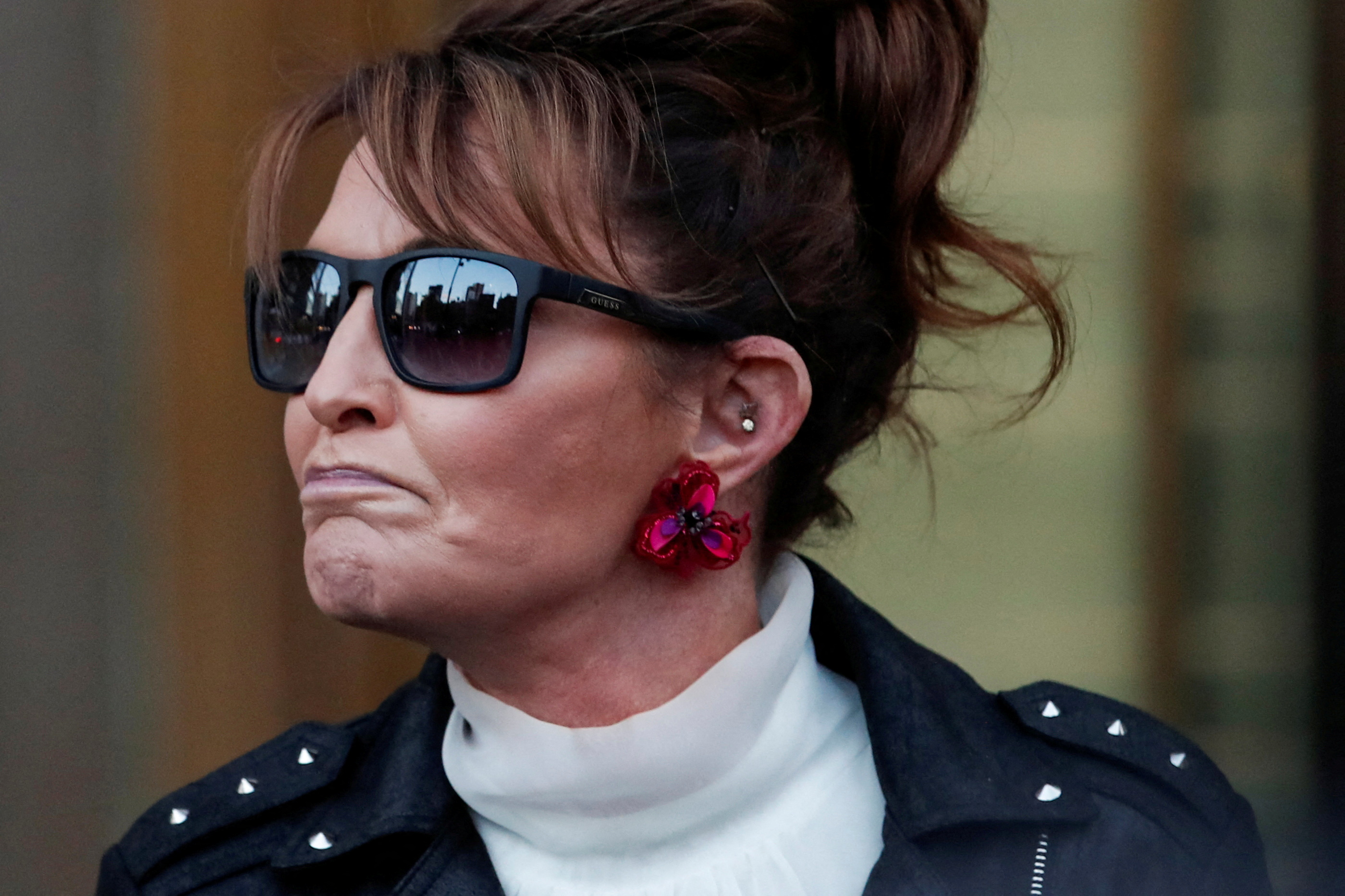 Sarah Palin, 2008 Republican vice presidential candidate and former Alaska governor, exits the court during her defamation lawsuit against the New York Times, at the United States Courthouse in the Manhattan borough of New York City, Feb. 14, 2022.