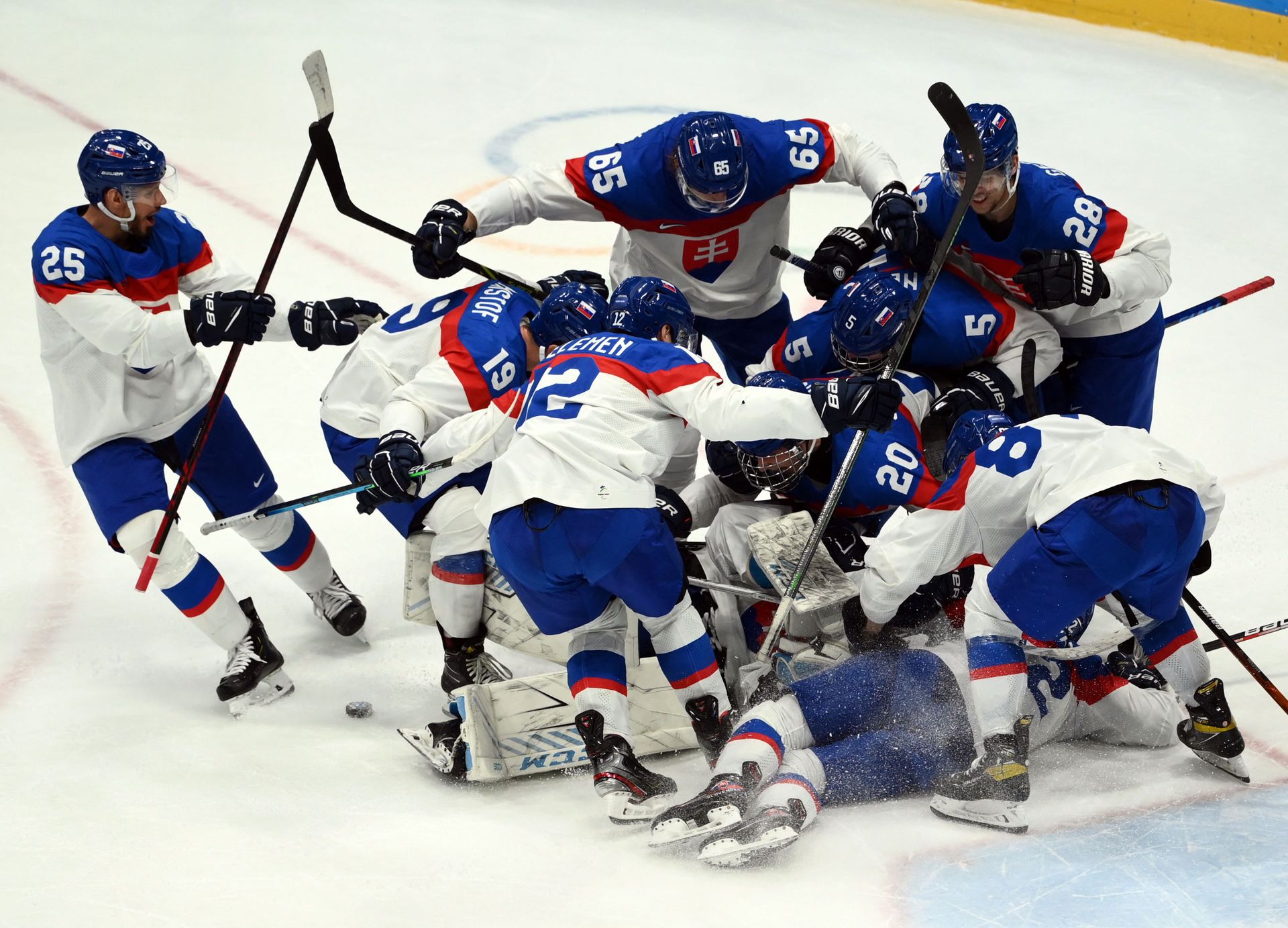 Slovakia players celebrate victory following their match against the U.S. at the National Indoor Stadium in Beijing, China on Feb. 16, 2022.