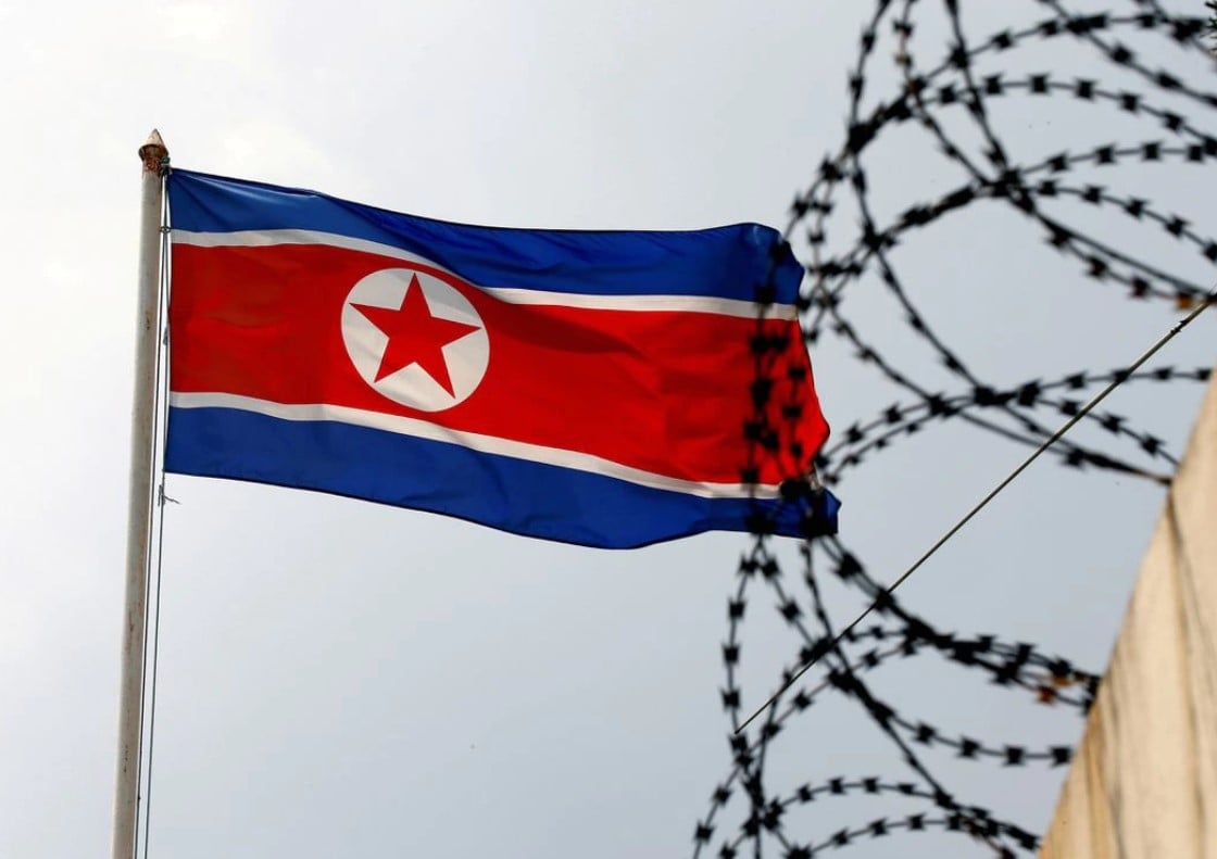 A North Korea flag flutters next to concertina wire at the North Korean embassy in Kuala Lumpur, Malaysia on March 9, 2017.