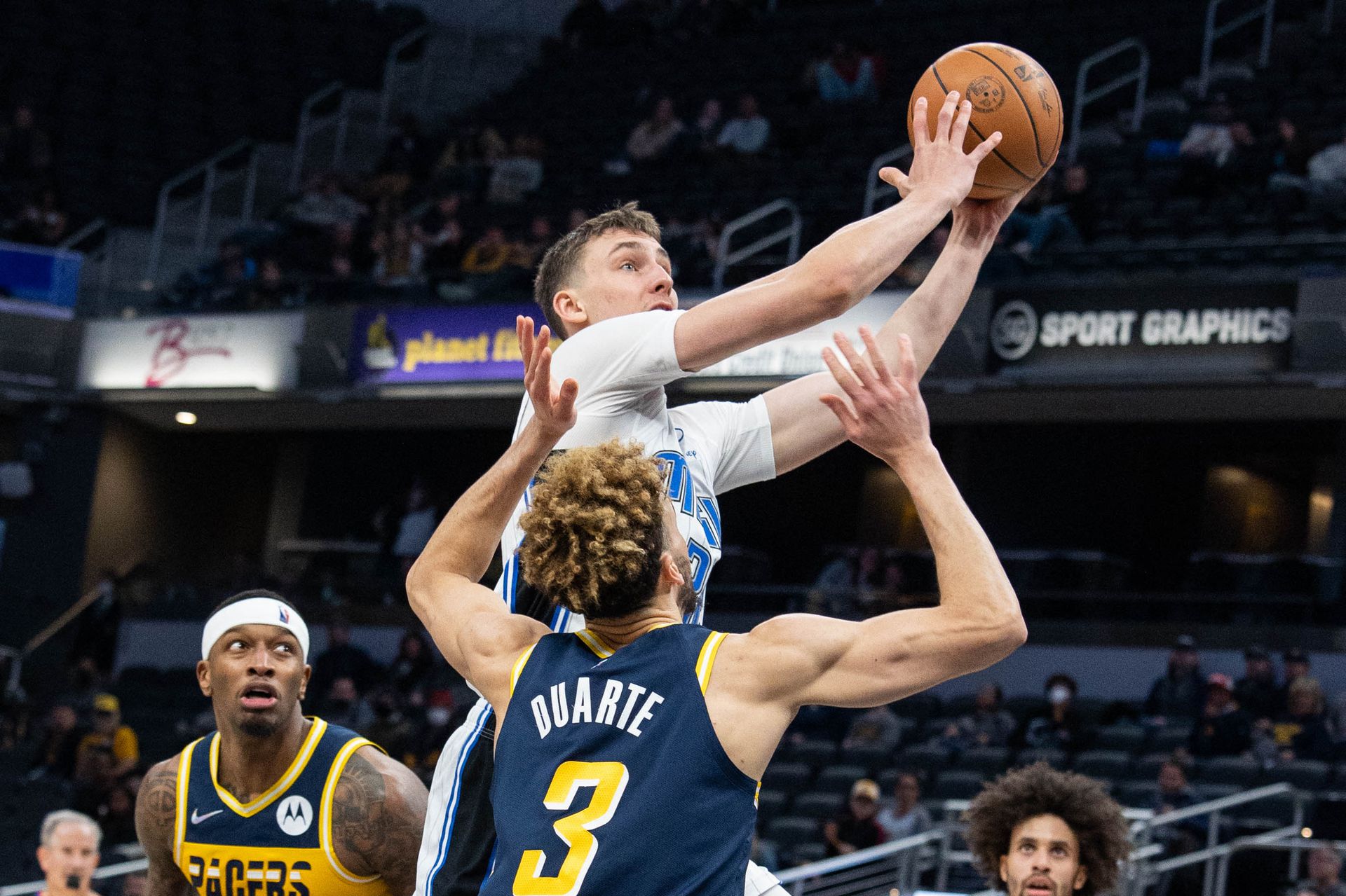 Orlando Magic forward Franz Wagner (22) shoots the ball while Indiana Pacers guard Chris Duarte (3) defends in the second half at Gainbridge Fieldhouse in Indianapolis, Indiana on Feb. 2, 2022.