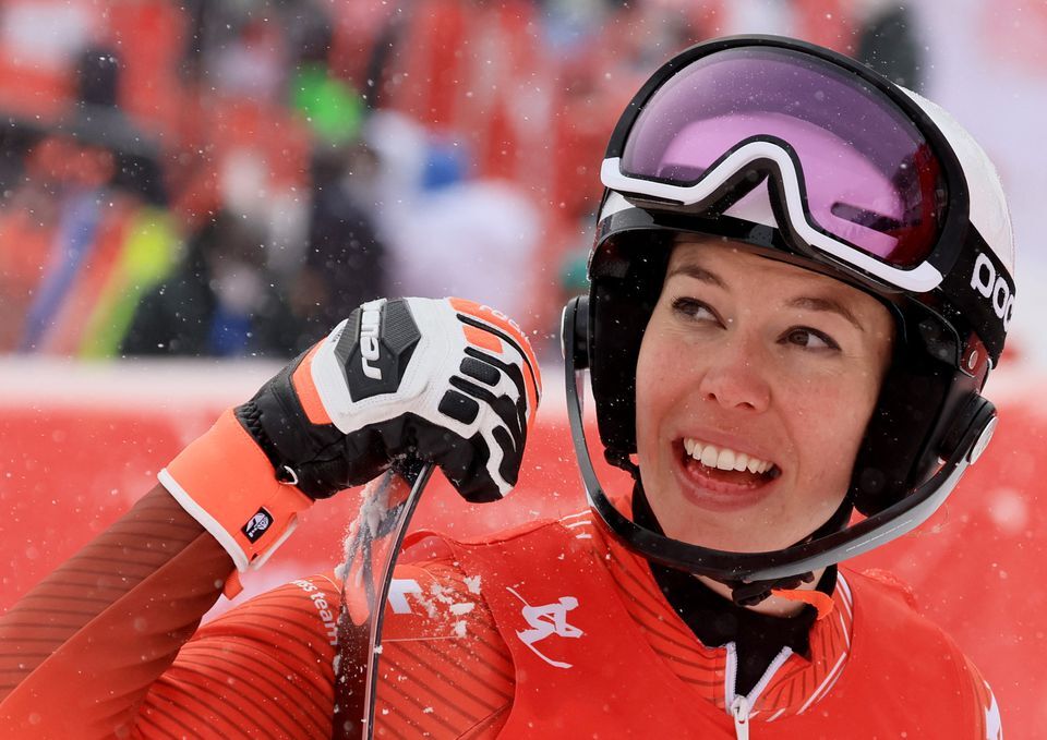 Michelle Gisin of Switzerland celebrates after winning gold at the National Alpine Skiing Center, Yanqing district, Beijing, China on Feb. 17, 2022.