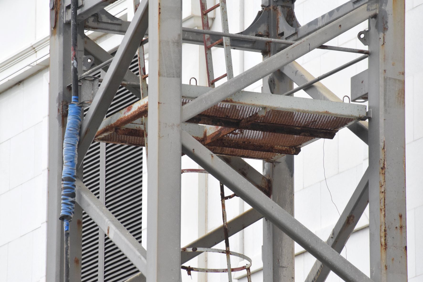 One of the platforms of the tower crane mast at the unfinished IPI casino-hotel is now  rusting.