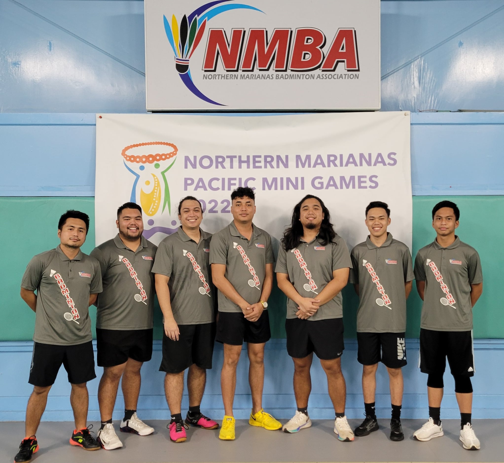The NMI Men’s National Badminton Team players gather for group photo before a training session at the TSL Sports Complex last month.