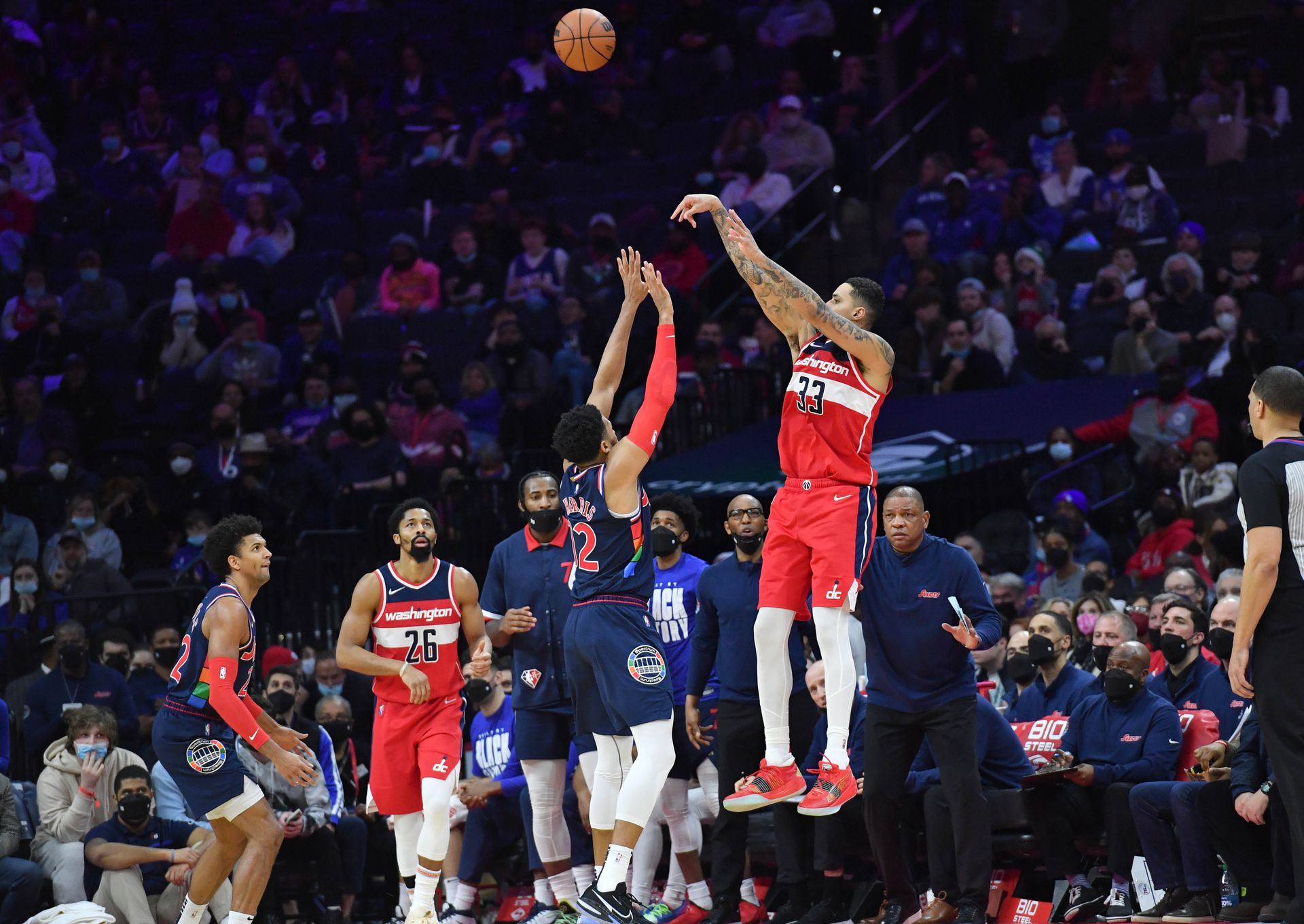 Washington Wizards forward Kyle Kuzma (33) shoots a three point basket against the Philadelphia 76ers during the third quarter at Wells Fargo Center in Philadelphia, Pennsylvania on Feb. 2, 2022.