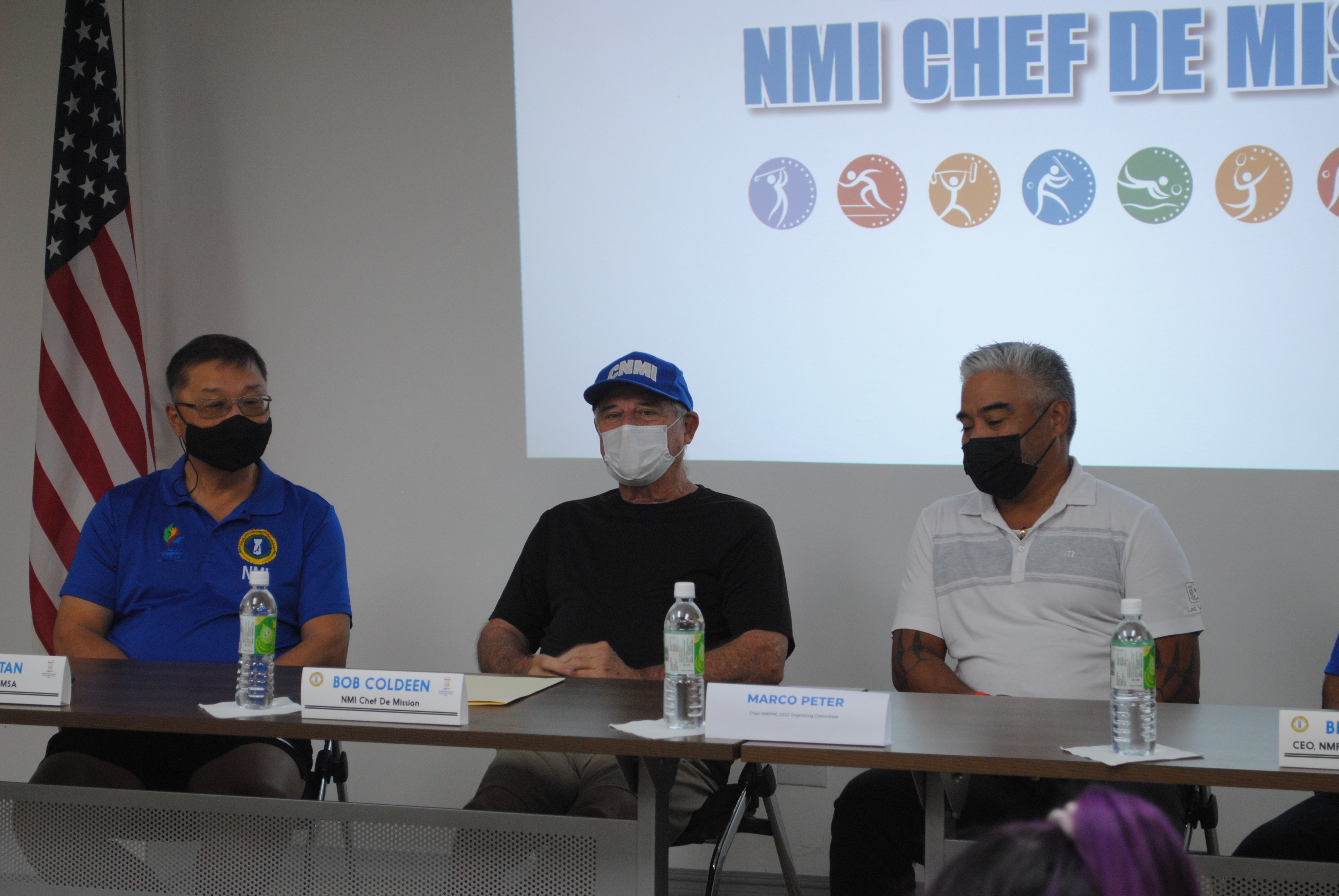 Bob Coldeen, center, is NMI chef de mission in 2022 Pacific Mini Games.