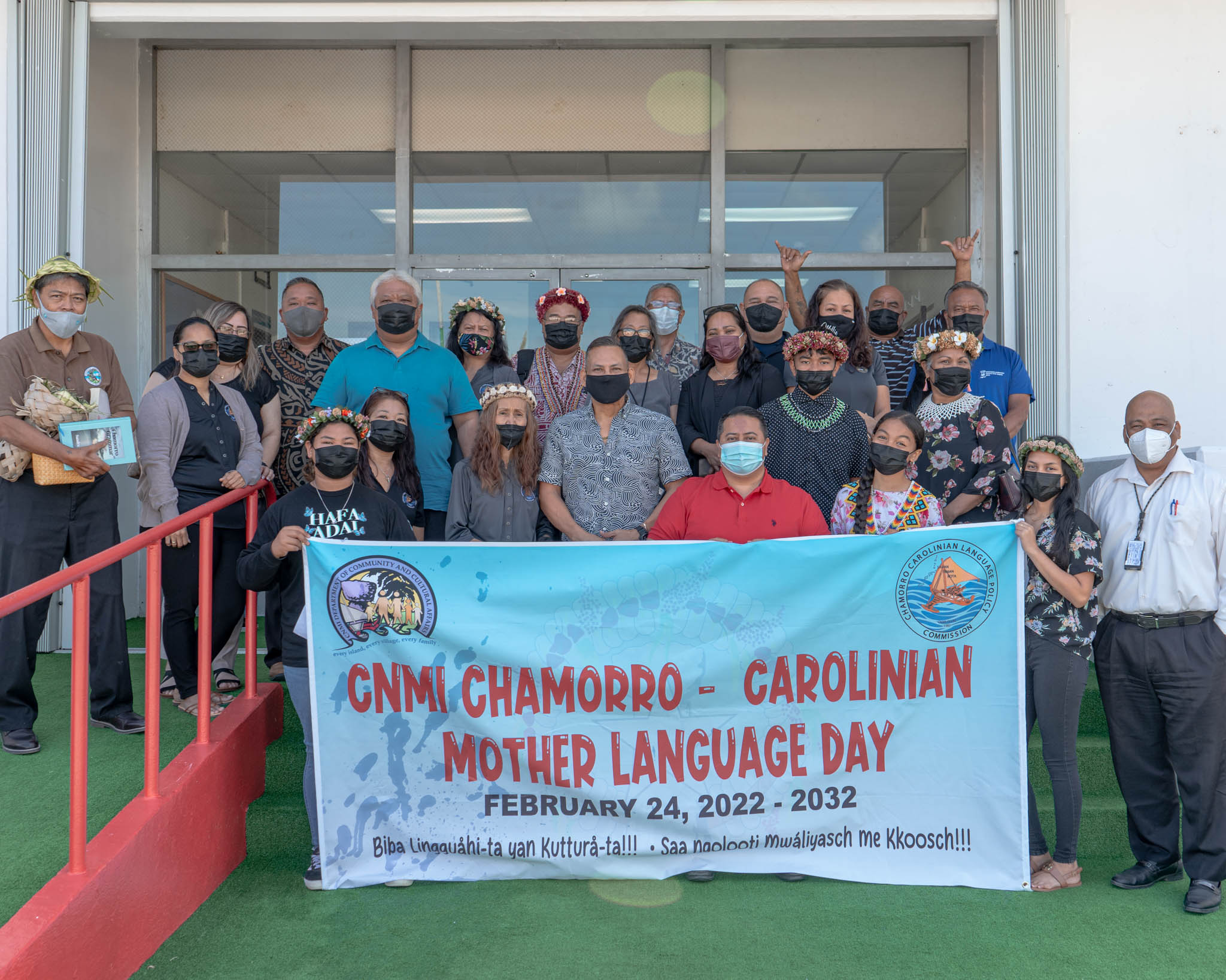 Gov. Ralph DLG Torres poses for a photo with lawmakers, other officials, educators, advocates and community members after signing the CNMI Chamorro-Carolinian Mother Language Day proclamation on Wednesday at the administration building on Capital Hill.