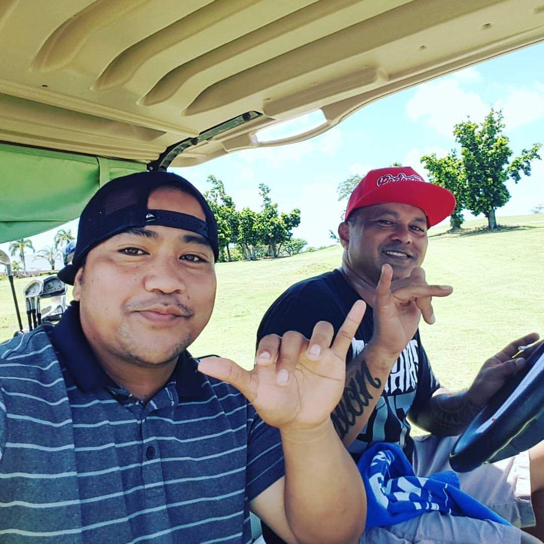 February Ace of the Month Isaac Aguon, left, poses for a photo with the president of the Marianas Golf Association, Melvin Sablan.