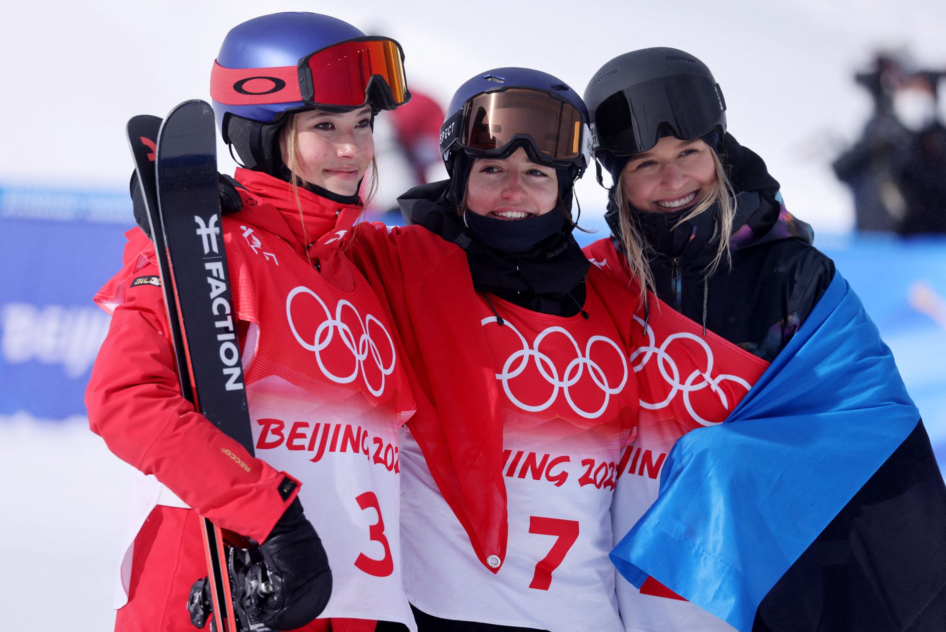 Gold medalist Mathilde Gremaud of Switzerland, Silver medalist Gu Ailing Eileen of China and Bronze medalist Kelly Sildaru of Estonia celebrate after the Women's Freeski Slopestyle  final at Genting Snow Park, Zhangjiakou, China on Feb. 15, 2022.
