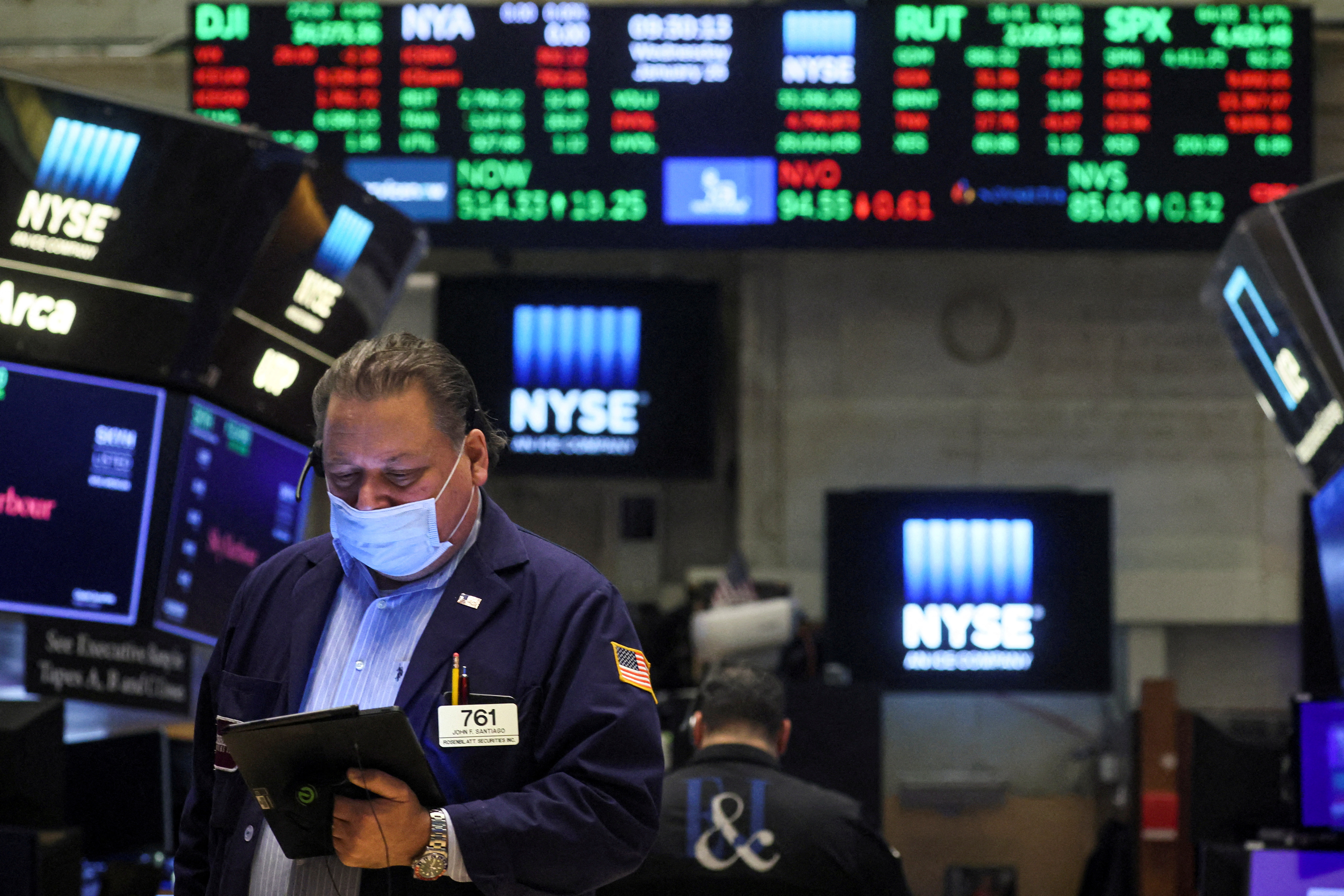 Traders work on the floor of the New York Stock Exchange in New York City, Jan. 26, 2022.