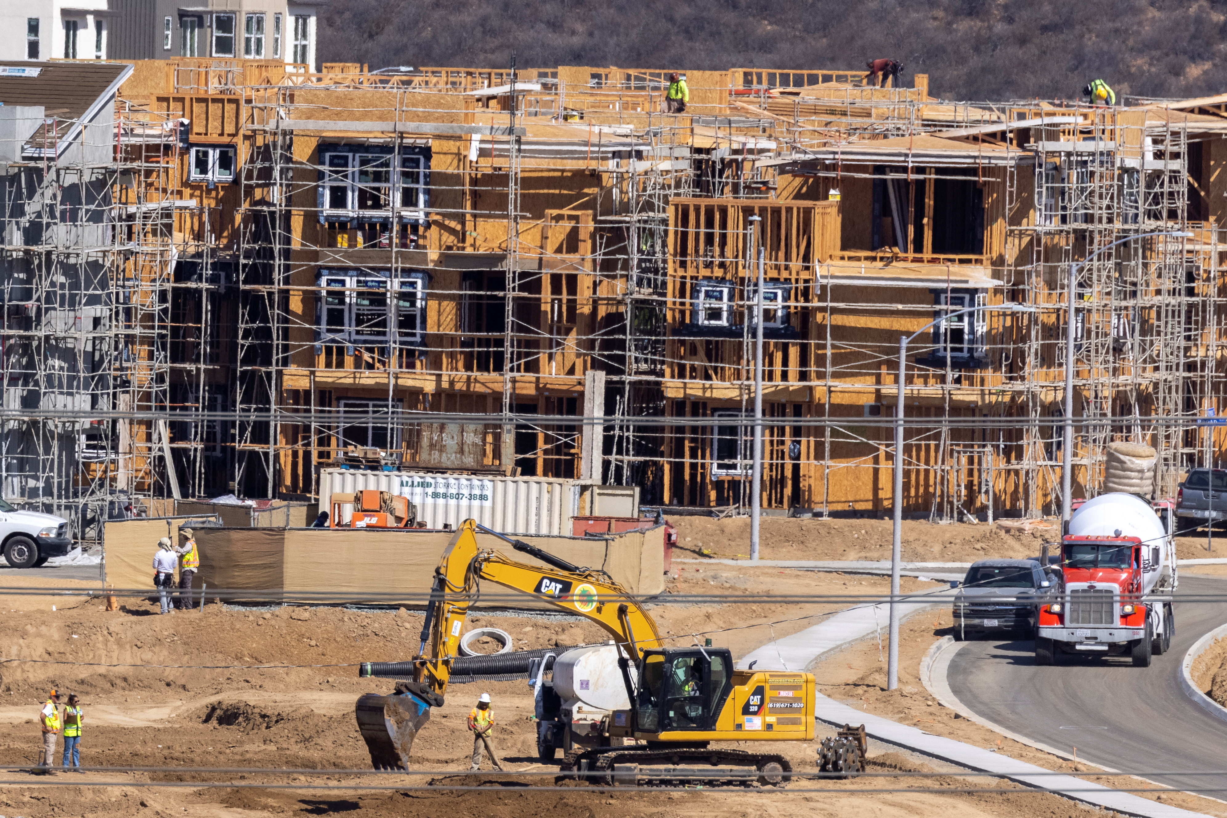 Construction continues on a large multi-unit housing development in San Diego, California, Sept. 20, 2021.