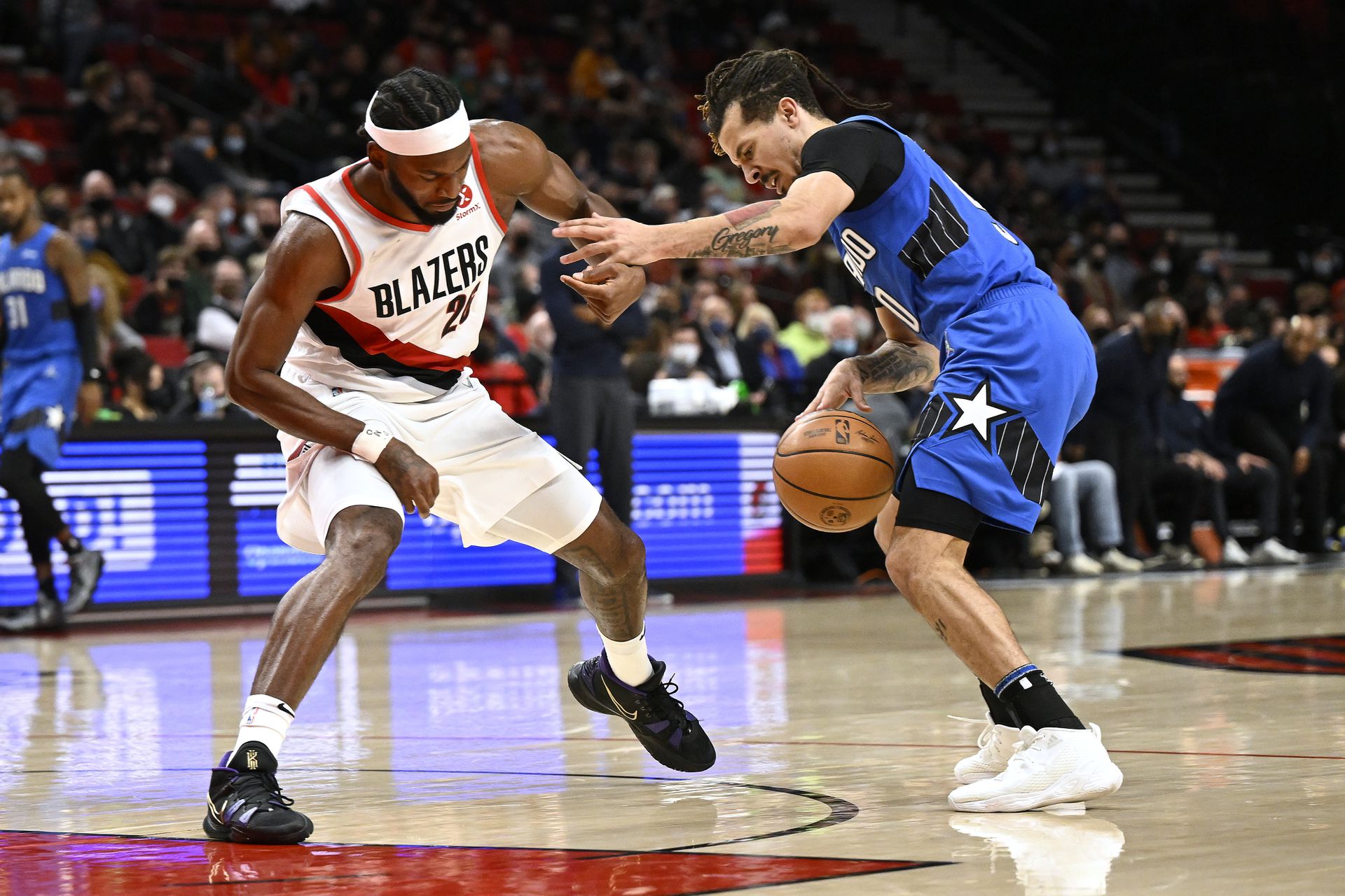 Orlando Magic guard Cole Anthony (50) steals the ball away from Portland Trail Blazers forward Justise Winslow (26) during the second half at Moda Center in Portland, Oregon on Feb 8, 2022. Orlando won the game 113-95.
