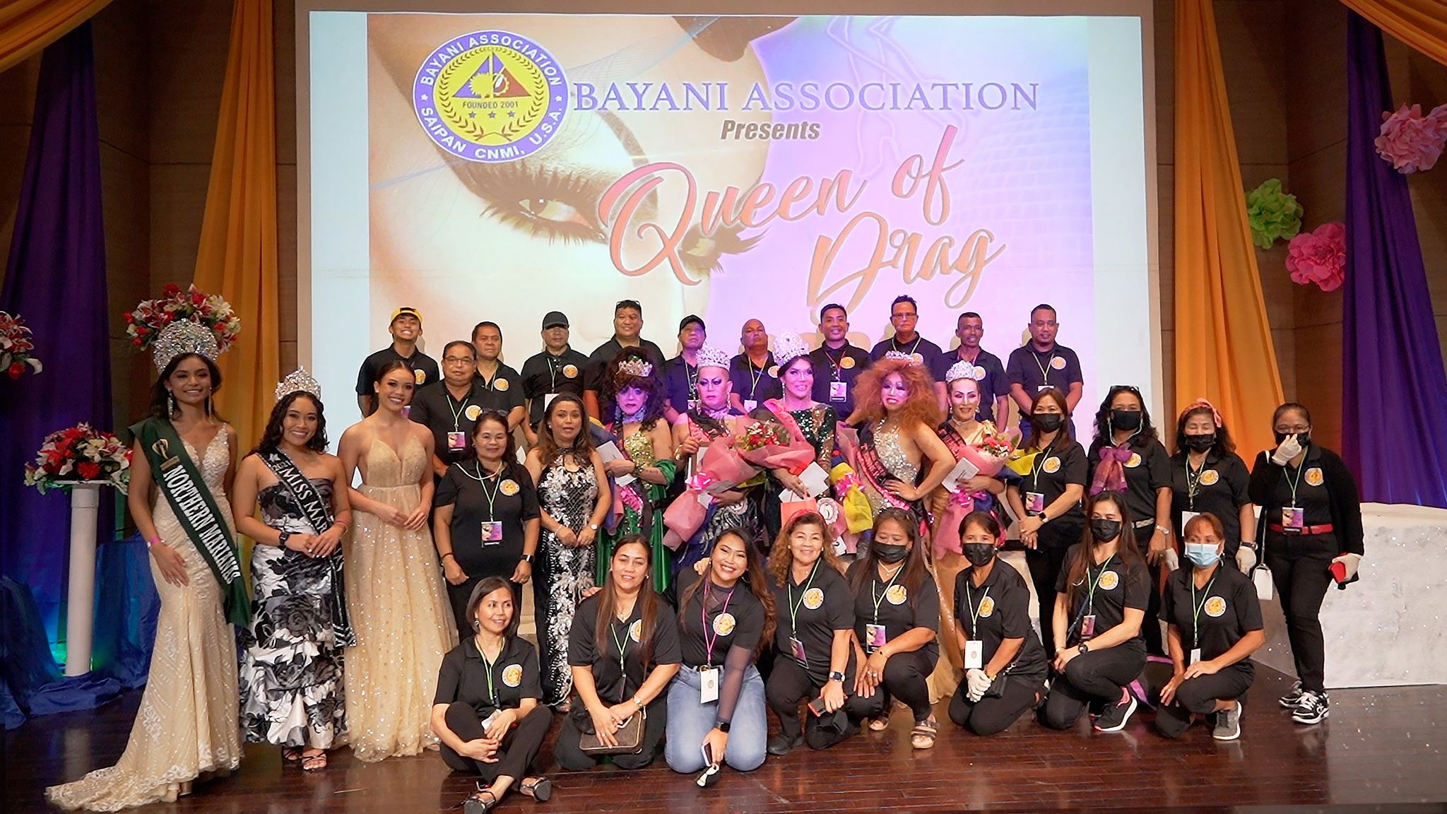 The pageant winners with organizers and some of the judges.