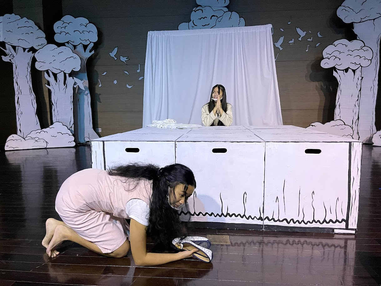 Liesel, portrayed by senior Tessie Rose Schweiger, seeks advice from her new governess, Maria, portrayed by Bernice Sabino.