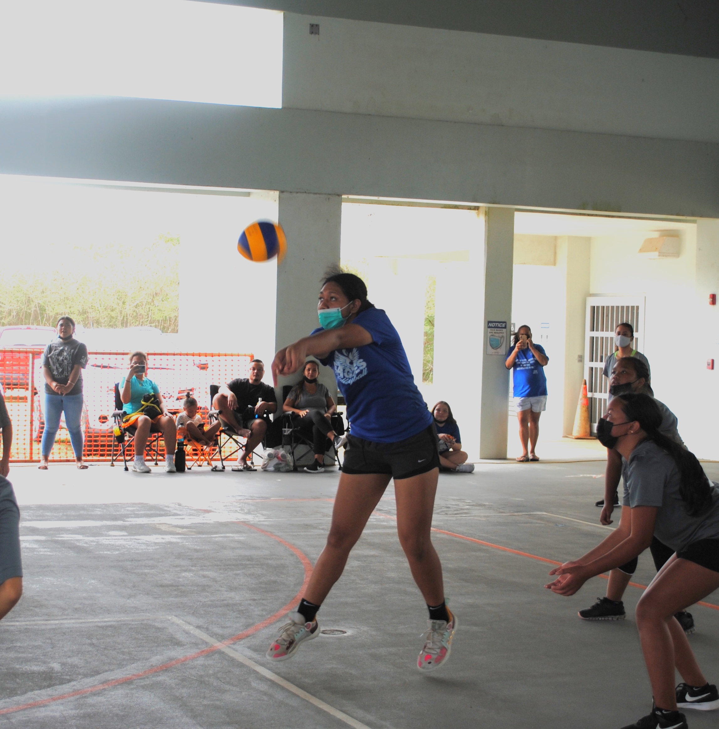 Grace Christian Academy’s Azzy Fatialofa extends for the bump return during the championship match of the PSS Girls Middle School Volleyball Tournament on Saturday at Koblerville gym.