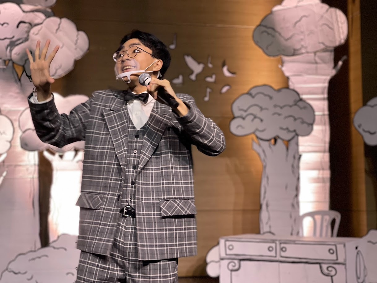 Max Detweiler, portrayed by longtime Theater Club member Brent Ortizo, expresses that he “likes the way he lives when he lives with rich people.”