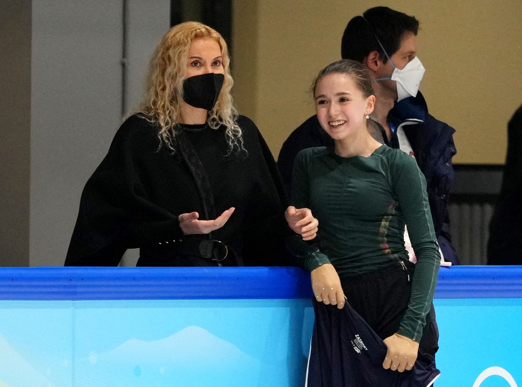 Russian Olympic Committee coach Eteri Tutberidze talks to Kamila Valieva of the Russian Olympic Committee during training at the Training Rink Capital Indoor Stadium, Beijing, China, Feb. 12, 2022.