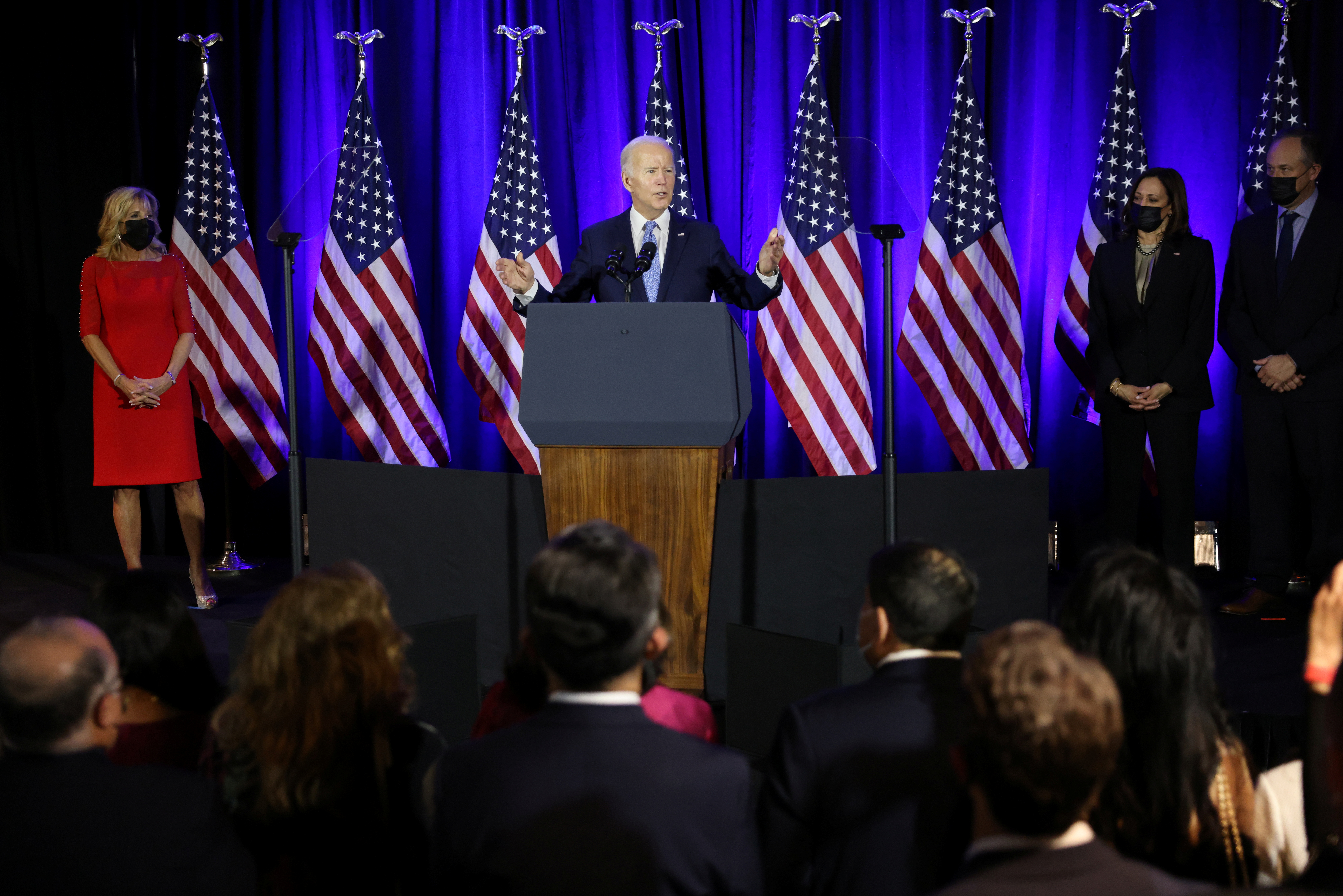 President Joe Biden speaks during a holiday celebration for the Democratic National Committee at the Hotel Washington in Washington, D.C, Dec. 14, 2021.