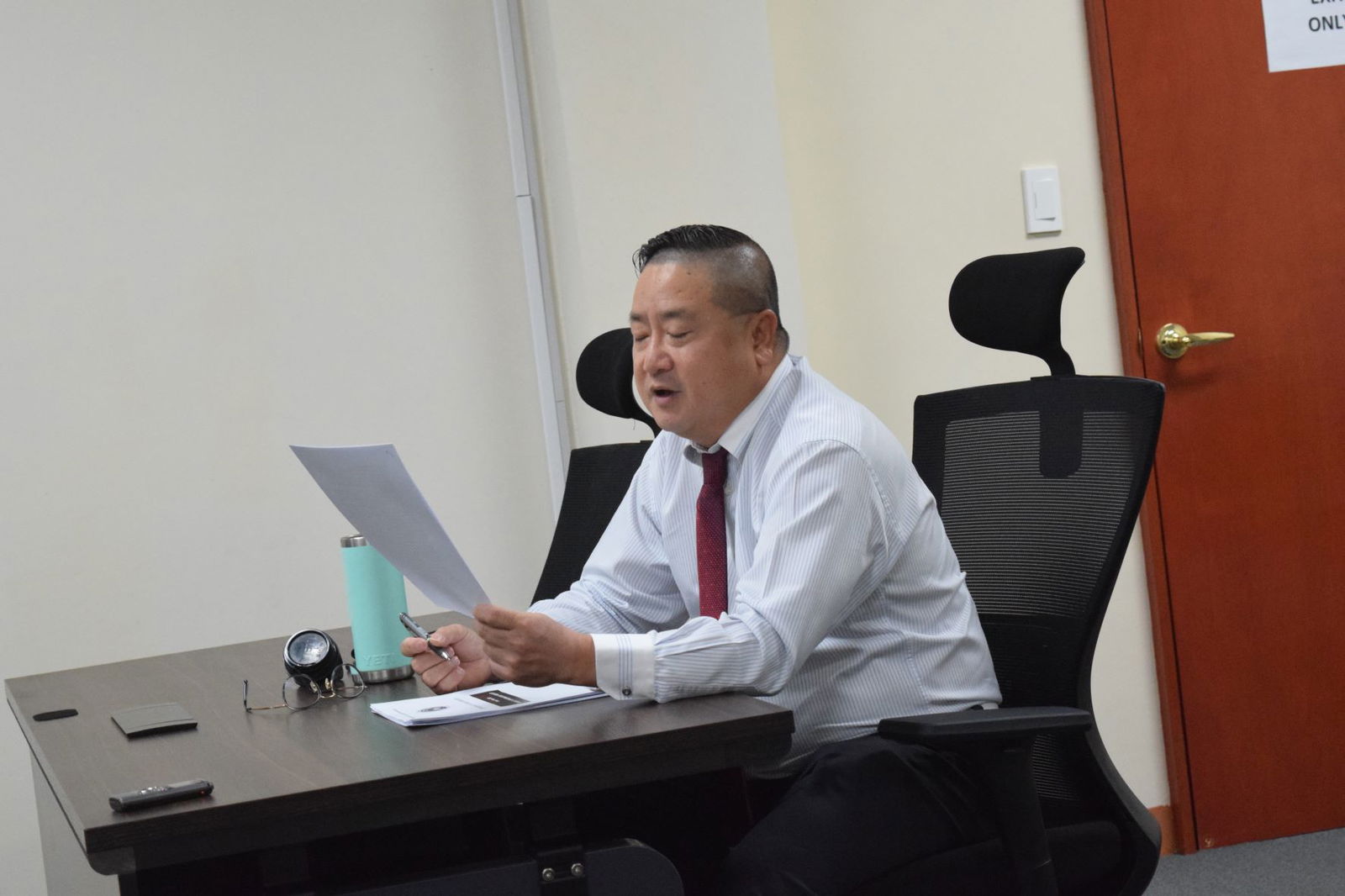 Commonwealth Casino Commission Executive Director Andrew Yeom reports to the commission on Thursday in the commission's conference room in Gualo Rai.