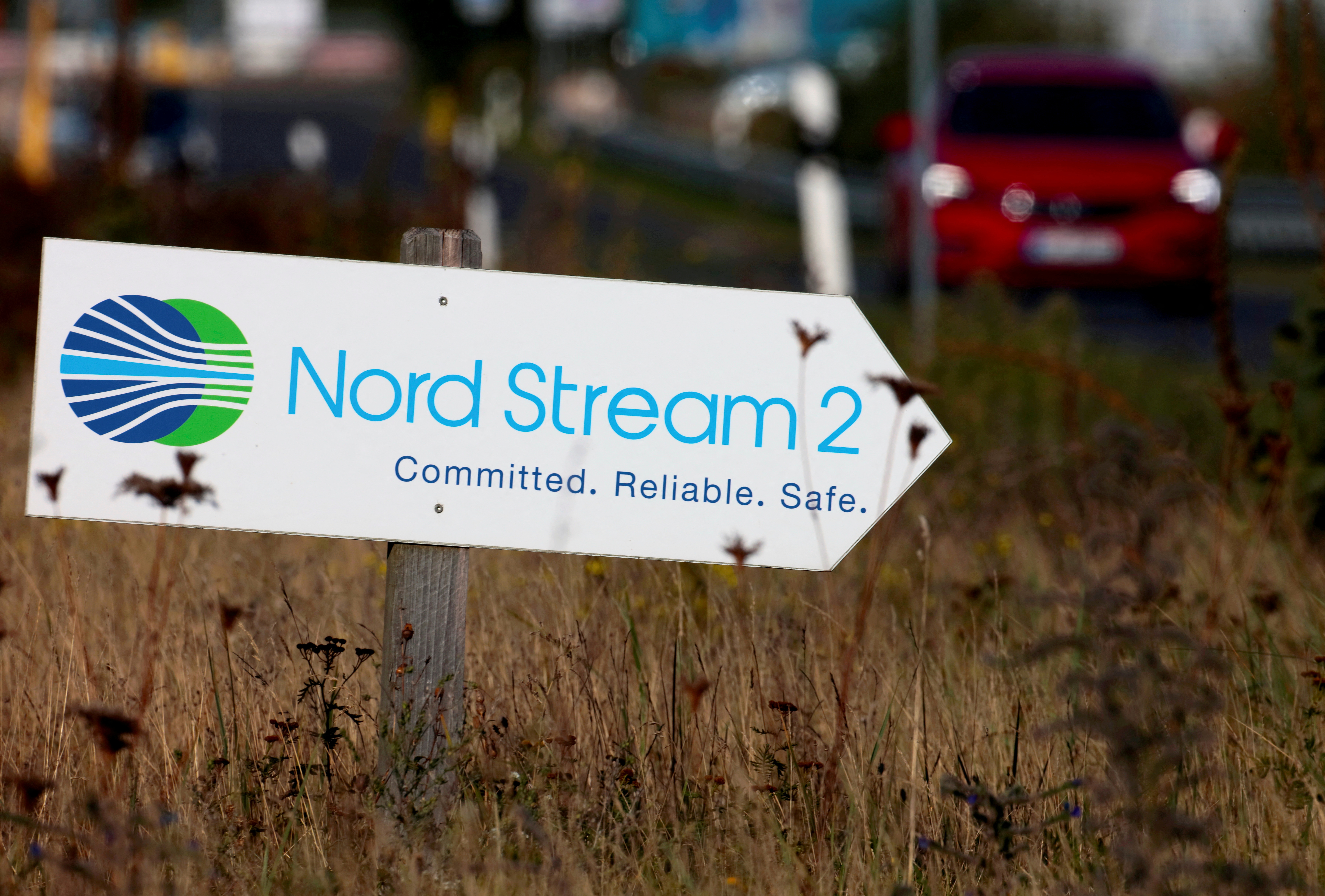 A road sign directs traffic towards the Nord Stream 2 gas line landfall facility entrance in Lubmin, Germany, Sept. 10, 2020.