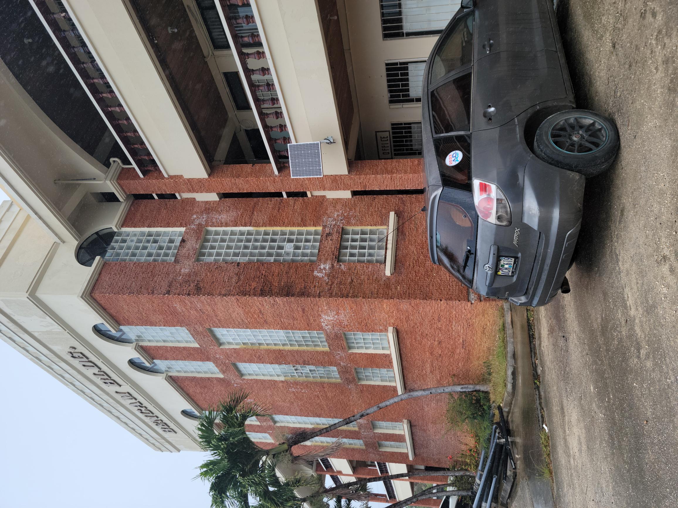 The vehicle of Roland Kapileo is  seen in the parking lot of Bencam Building in Garapan.