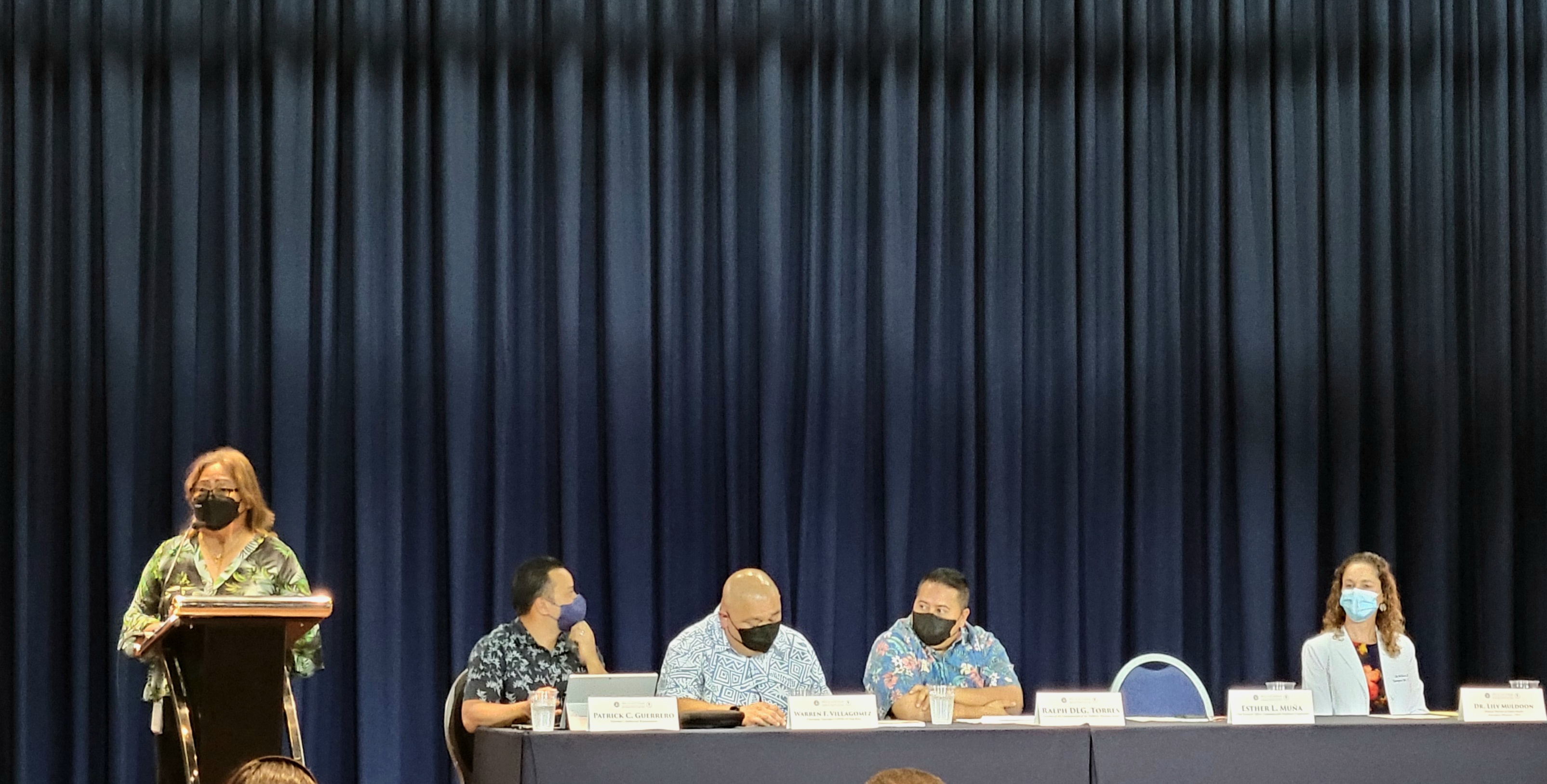 From left, Commonwealth Healthcare Corp. Chief Executive Officer Esther L. Muna presents at the CNMI Covid-19 Protocol Forum on Friday at Kensington Hotel as Governor's Authorized Representative for the Covid-19 Disaster Patrick Guerrero, Covid-19 Task Force Chairman Warren F. Villagomez, Gov. Ralph DLG Torres and Dr. Lily Muldoon, CHCC medical director of public health listen.