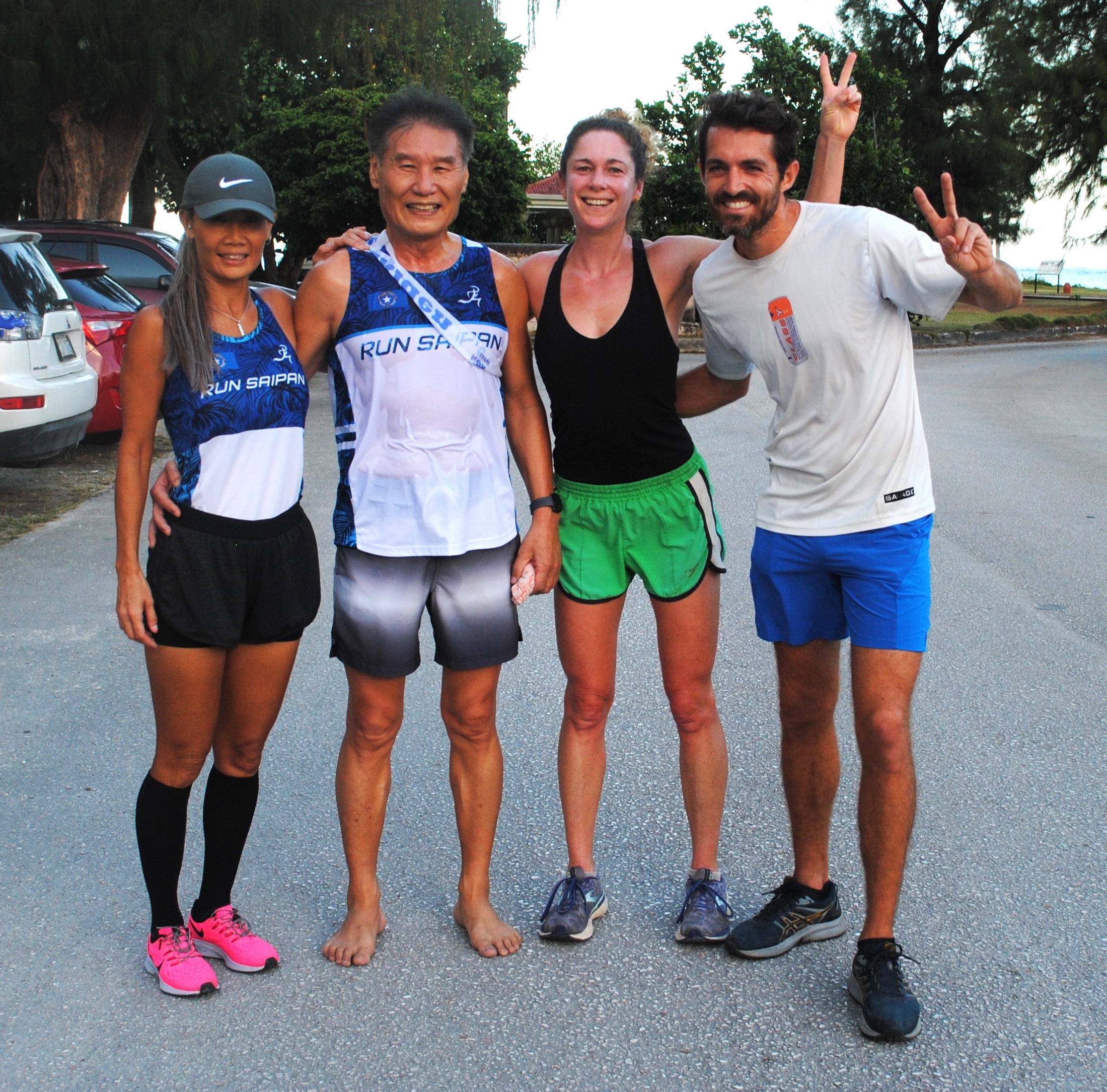 Team Run Saipan members pose for a photo after completing the Marianas Ekiden  at  American Memorial Park on Saturday.