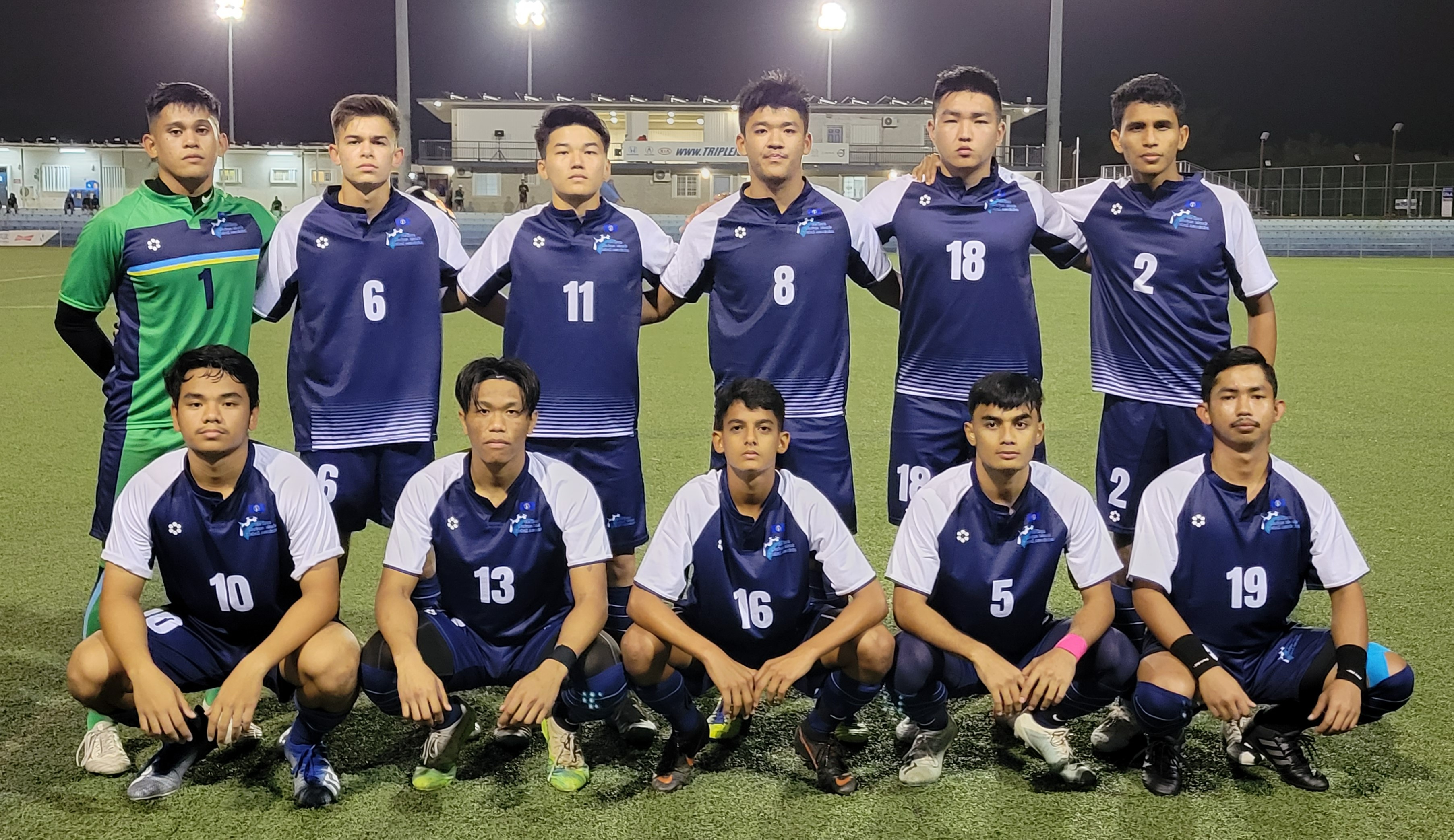 The CNMI Men's National Team members pose for a photo before their friendly match against their Guam counterparts Saturday at the Guam Football Association National Training Center in Dededo. Guam won, 2-0.