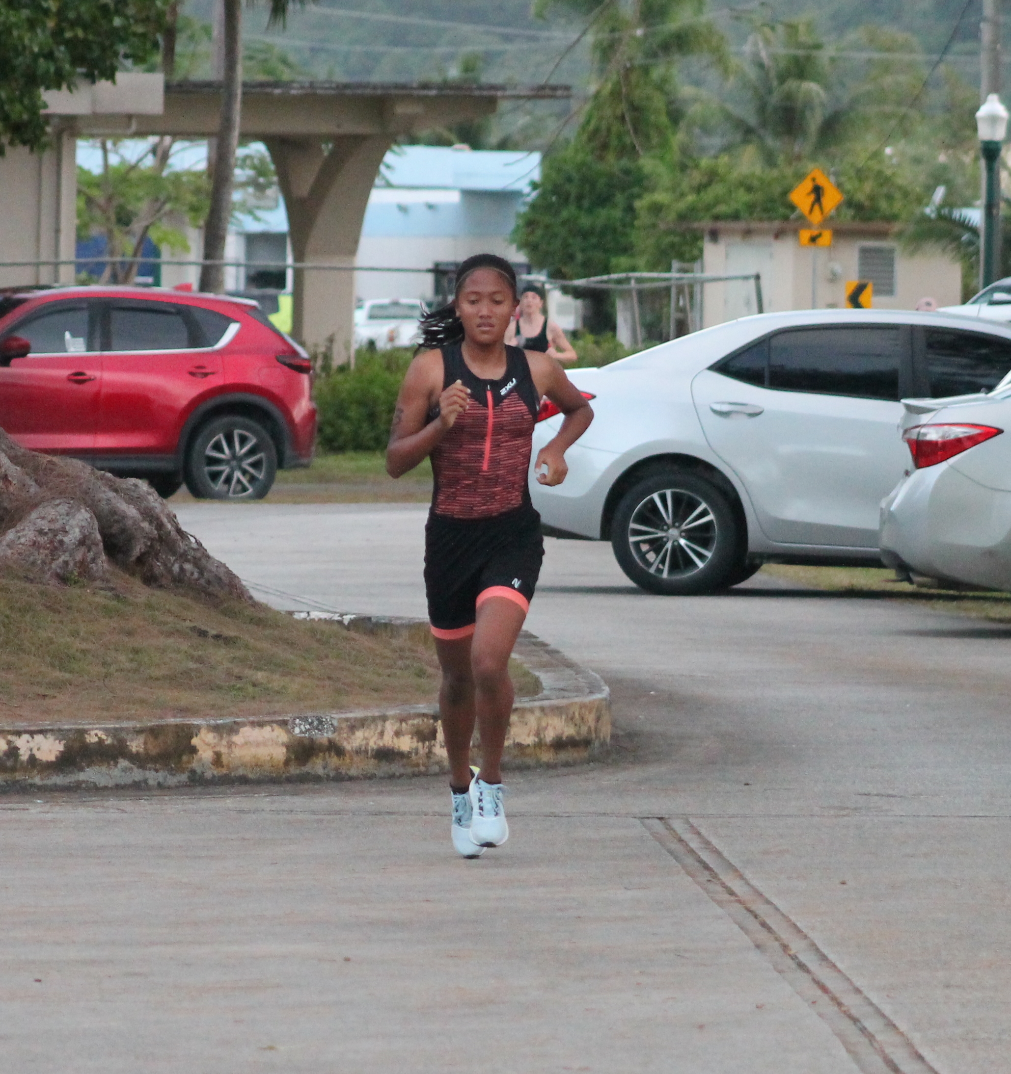 Kaithlyn Chavez pushes through for a first-place finish in the female division of TRAC's 7th Aquathon at the Kilili Pavilion on Saturday morning.