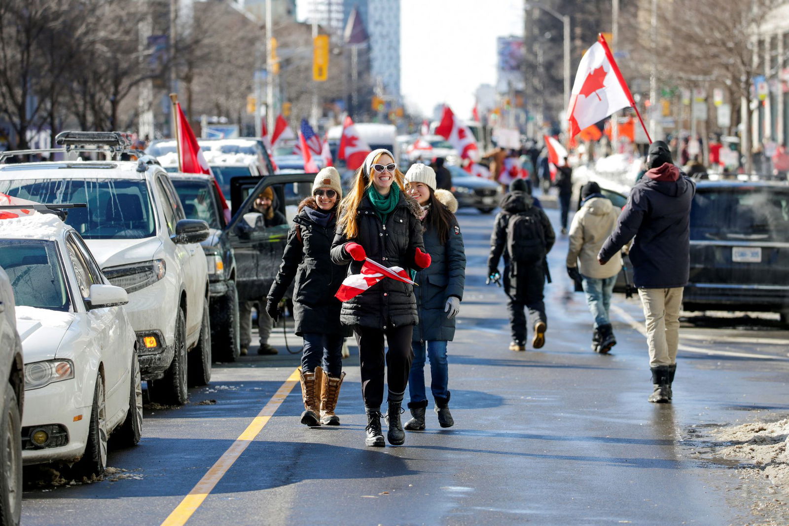 Protesters occupy Bloor Street West as truckers and supporters continue to protest coronavirus disease vaccine mandates, in Toronto, Ontario, Canada, Feb. 5, 2022.