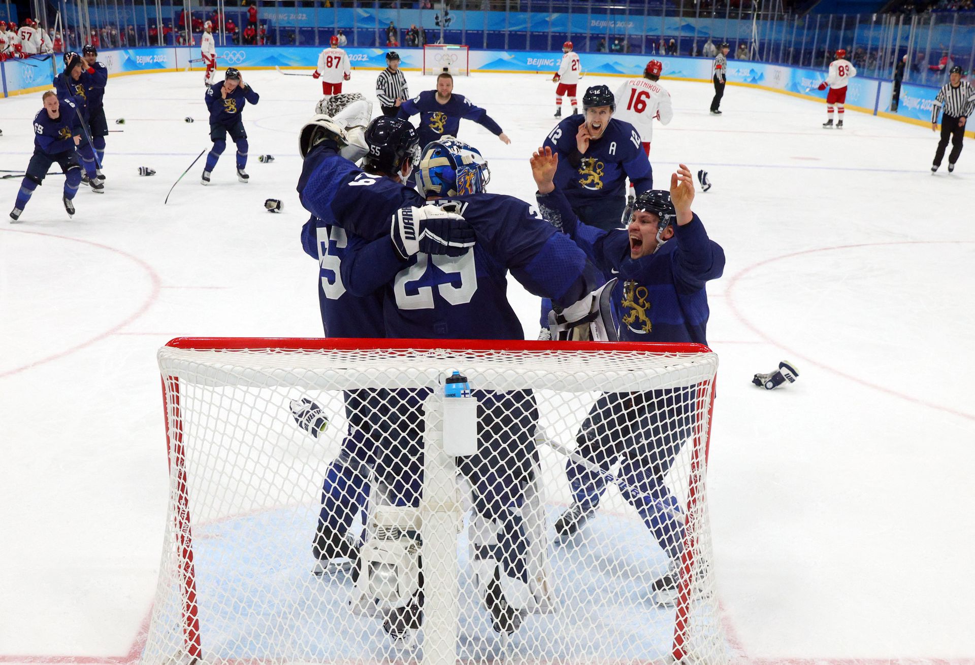 Finland players celebrate after winning the gold medal game against Russia at the National Indoor Stadium, Beijing, China on Feb. 20, 2022.