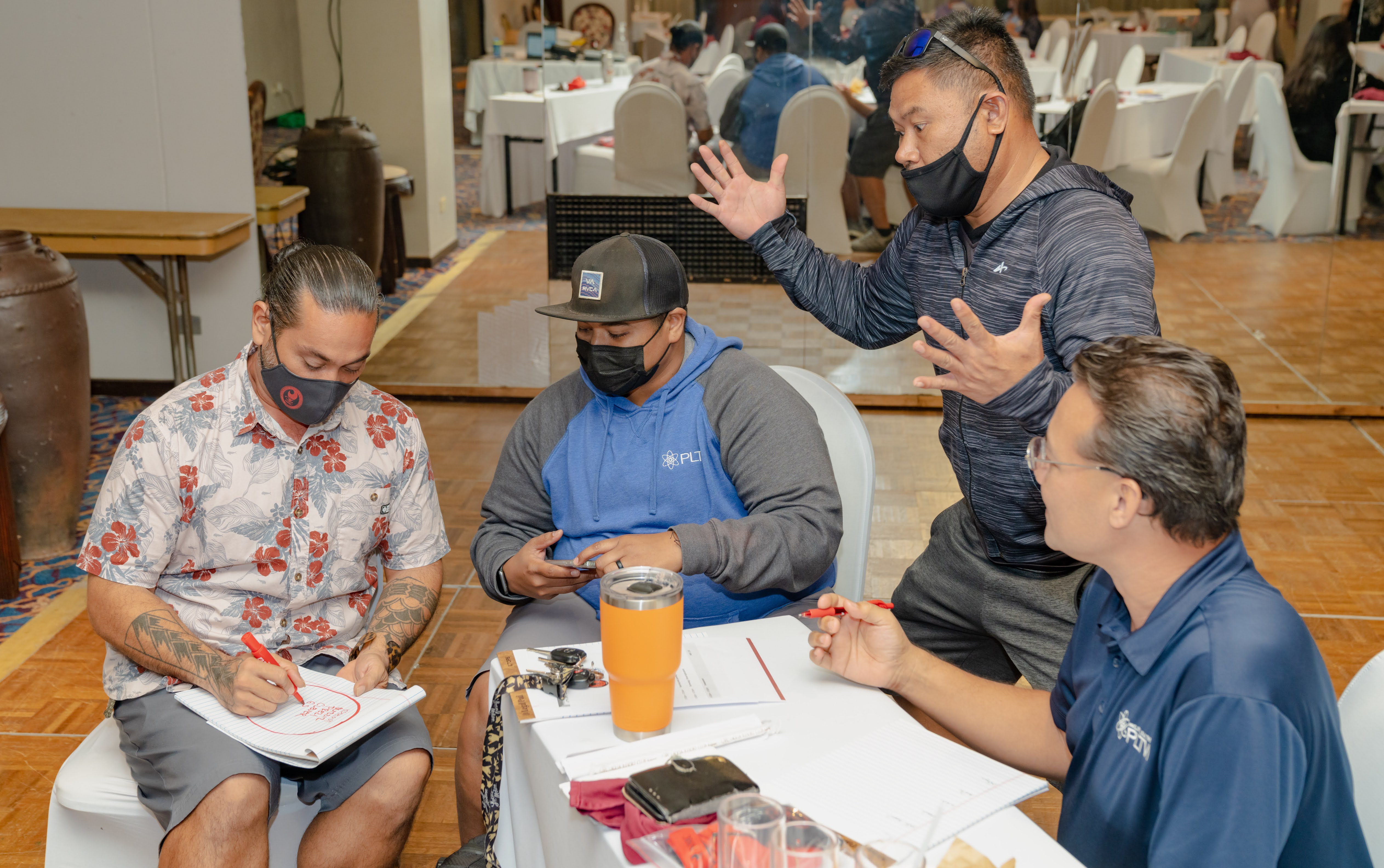 Public School System teachers participate in an activity during one of the training seminars conducted by the Northern Marianas College’s Community Development Institute and PSS.