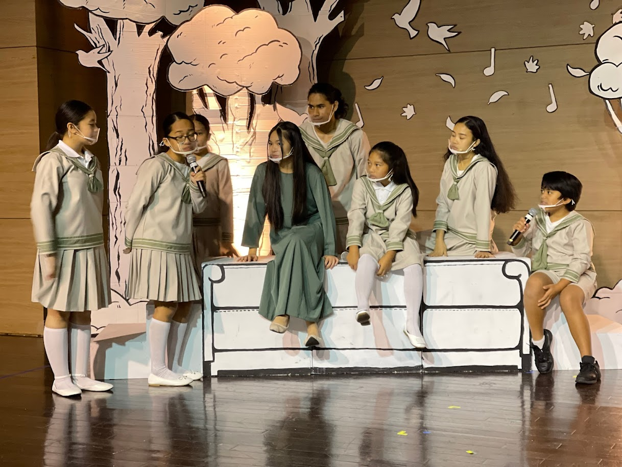 Bernice Sabino, who plays Maria, teaches the von Trapp children the ABCs of singing in “Do-Re-Mi.”