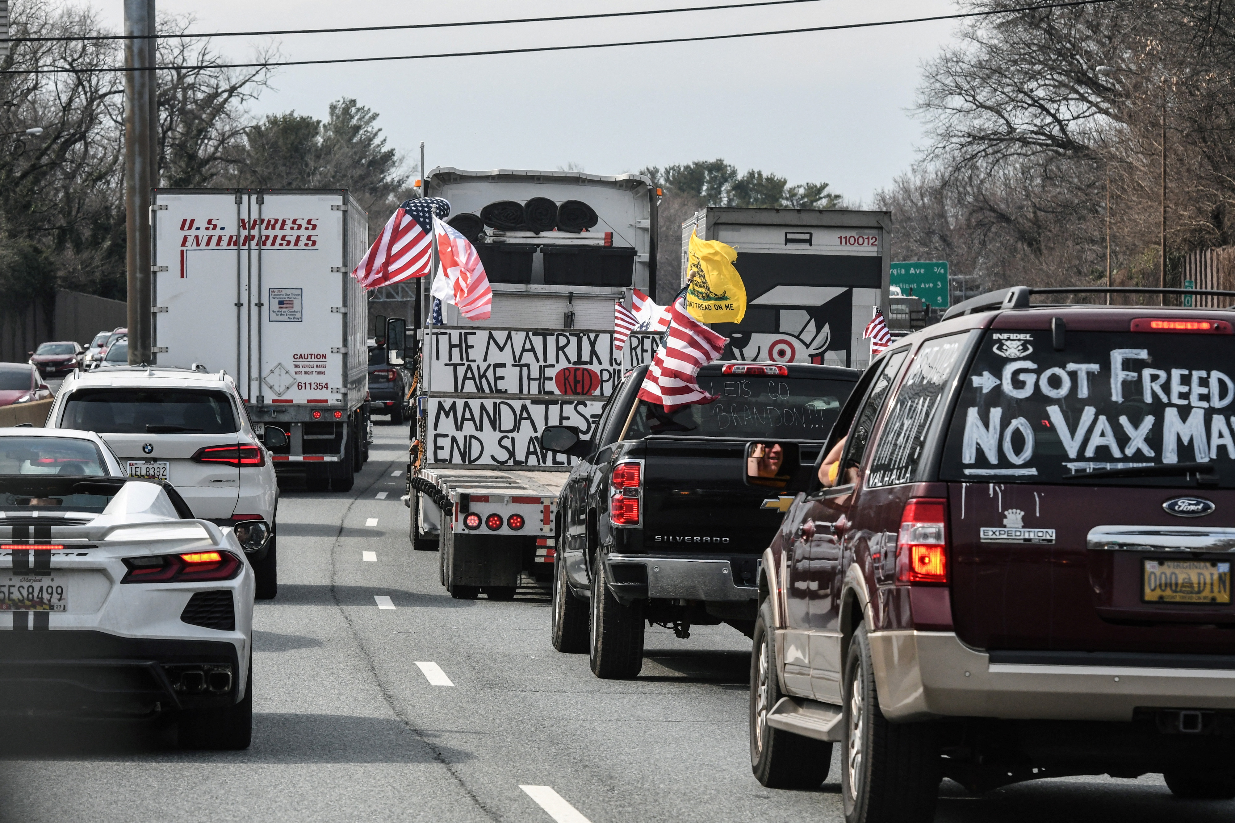 Vehicles, including 18-wheeler trucks, RVs and other cars drive toward Washington, D.C., after some of them arrived as part of a convoy that traveled across the country, to protest coronavirus disease-related mandates and other issues, in Hagerstown, Maryland on March 6, 2022.