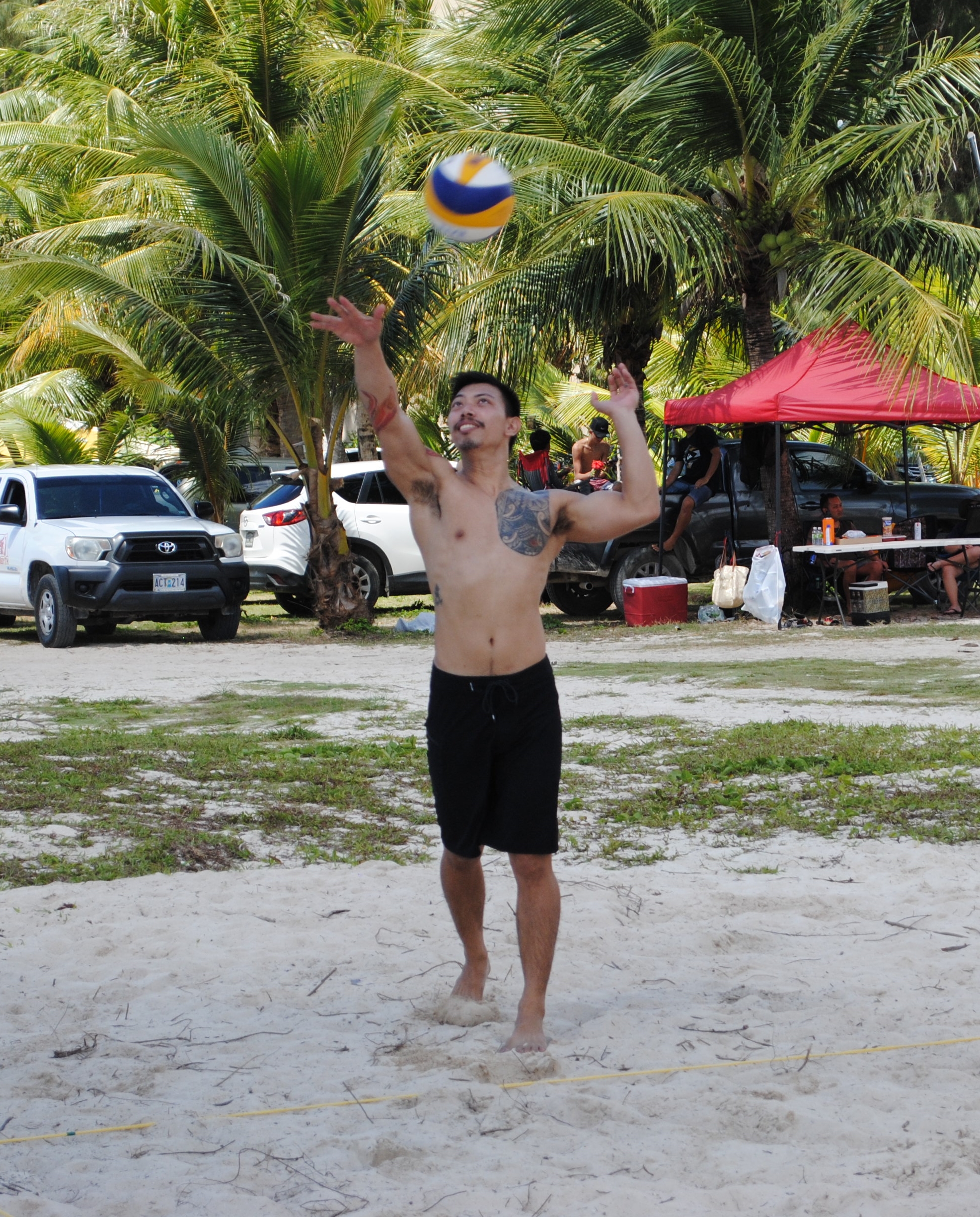 Alfredo Guevarra attempts an overhead serve.