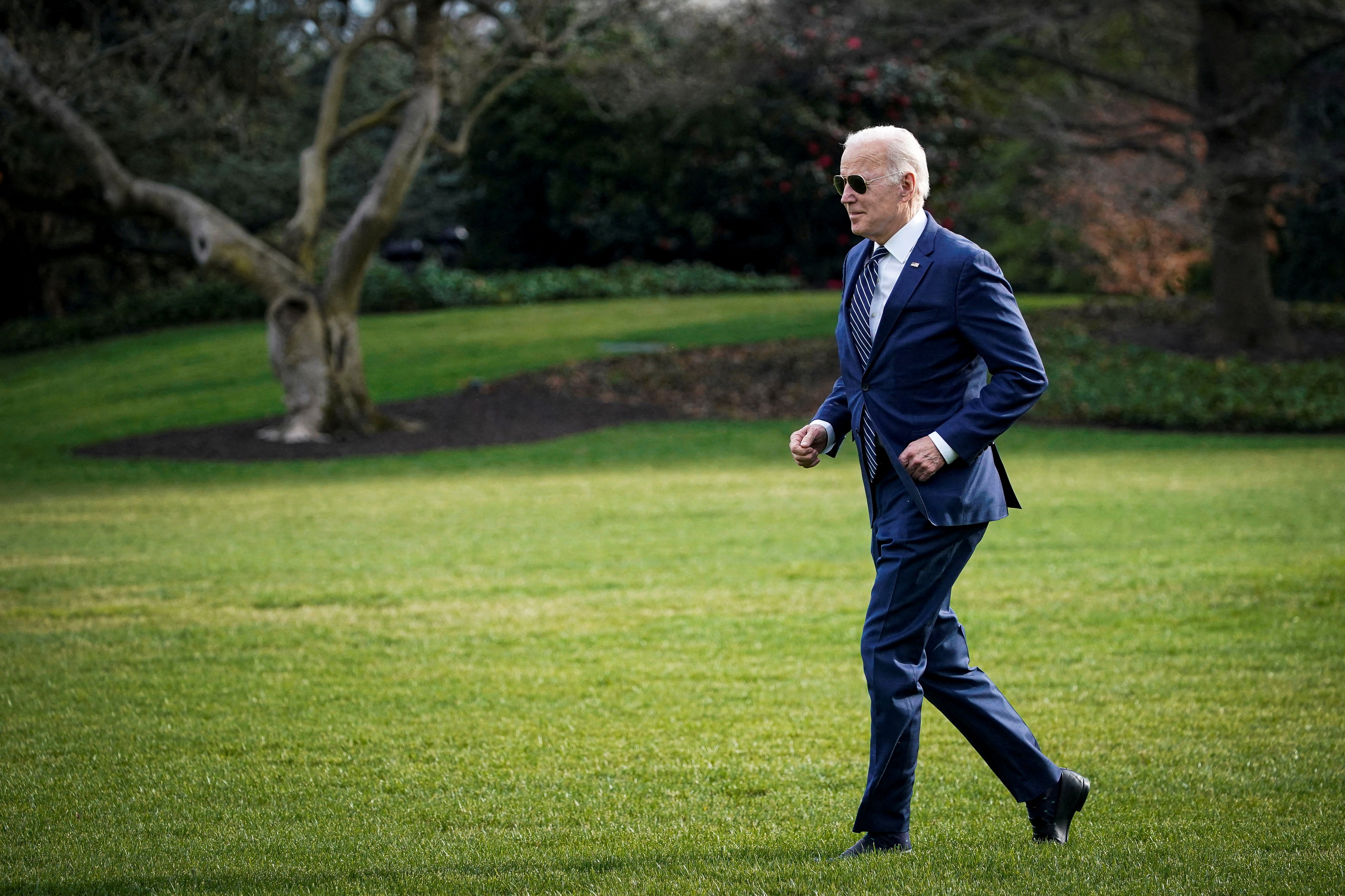 President Joe Biden walks to board Marine One, before traveling to Rehoboth Beach, Delaware for the weekend, on the South Lawn of the White House in Washington, D.C., March 18, 2022.
