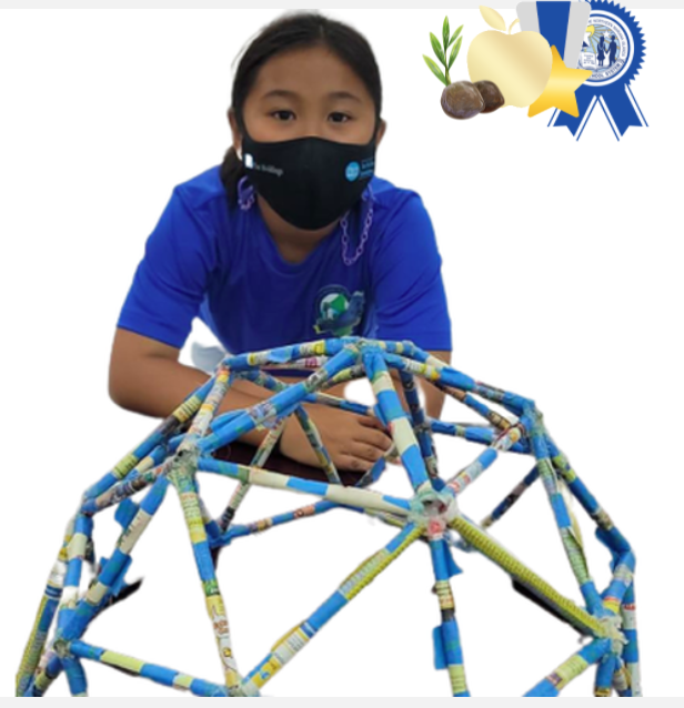 "Super Geo Dome" by Bianca Manlulu of Tinian Elementary School won the general science K-2 category and the Commissioner STEM Award.  According to Manlulu, “Geodesic domes are said to be durable and strong. In this project, we will learn if this is fact or fake. If this is a fact, this may be suitable for homes in our islands because we experience strong typhoons.”